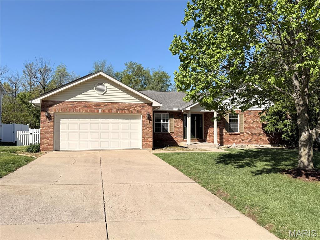 Tucked on a private lot in the desirable Pioneer Ridge subdivision of Columbia, this charming 3 bed, 3 bath ranch is ready for you to call HOME. Step inside to find the perfect blend of comfort and sophistication, with hard wood flooring throughout the main living areas and a versatile formal dining room that could easily be converted into a home office. The spacious living room features a vaulted ceiling, brick fireplace, and professionally installed high-quality surround sound system that will remain for the new owner—creating the perfect space for relaxing evenings or entertaining guests. The well-appointed kitchen offers abundant cabinet and counter space for meal prep and flows seamlessly into the breakfast room and inviting four-season room. From here, enjoy beautiful sunset views or step out onto the large maintenance-free deck overlooking the private backyard—perfect for morning coffee or evening gatherings. Down the hall you’ll find the convenient main floor laundry along with the primary suite featuring a walk-in closet and private bath. Two additional bedrooms and a full bath complete the main level. The finished lower level provides even more living space with a large family room perfect for movie nights, game days, or hosting guests, along with a full bath and ample space for storage or future expansion. Step outside to a fully fenced backyard featuring a concrete patio and plenty of functional green space to enjoy. Homes offering this combination of space, privacy, and location don’t come along often—don’t miss your chance to make this one yours. Schedule your showing today!