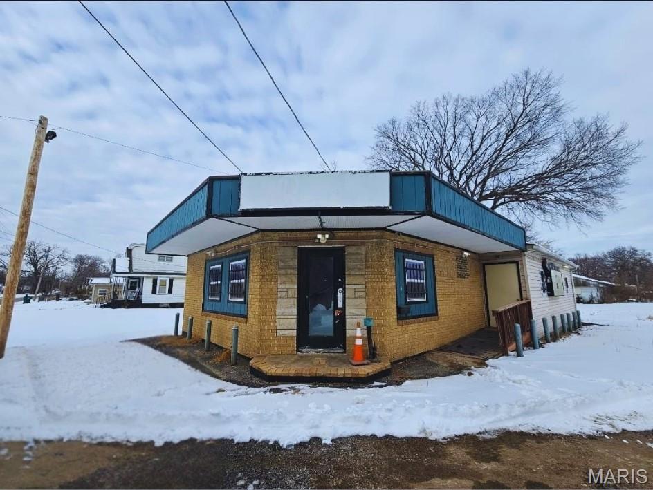 Positioned on a high-visibility corner in Cahokia, this versatile commercial property offers a great opportunity for a variety of business ventures. Located within walking distance of the local high school, it benefits from steady foot and vehicle traffic ideal for attracting consistent customers.

The 576 sq ft concrete block building is well-suited for retail, service-based businesses, or office use. Previously operated as a salon, the space includes existing trade fixtures that can help you get started right away. A full basement provides additional room for storage or operational needs, while updated mechanicals including a newer furnace and central air add to the property’s functionality.

Outside, the paved lot offers convenient on-site parking for both clients and staff. Whether you’re looking to launch a new business or expand your current one, this property delivers strong potential in a prime location.