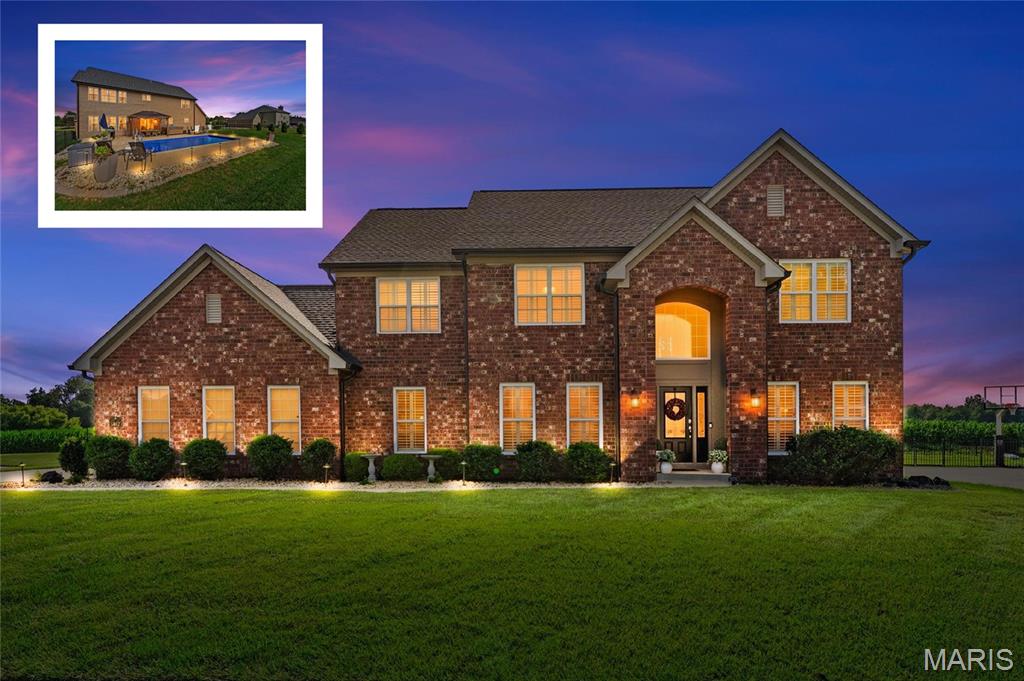 Over 4,500 total finished square feet of turn-key luxury living! Prepare to fall in love with this stunning custom-built masterpiece by Fulford Homes nestled on a quiet cul-de-sac in highly coveted Woodfield Lake Estates with absolute privacy and no backyard neighbors. Located just minutes from Scott Air Force Base, I-64, and downtown St. Louis, with scenic Clinton Hills Conservation Park directly across the street from the subdivision entrance (walking trails, tennis courts & Fletchers).  Extensively updated from 2024 through 2026, this 4-bedroom, 4.5-bathroom residence welcomes you with a dramatic two-story foyer, fresh interior paint, plantation shutters, and brand-new real hardwood flooring throughout the main level. The main level features a private home office/parlor with French doors, a formal dining room, a half bath, a dedicated laundry room, and a flexible bonus/flex room ideal as a playroom or second office. At the heart of the home, the spacious family room centers around a gas fireplace and opens to the updated eat-in kitchen with granite countertops, staggered cabinetry with crown molding, stainless steel appliances (2024 refrigerator and range), center island with bar seating, extended countertop drop zone, and a walk-in pantry.  Upstairs, the newly carpeted staircase leads to an oversized primary suite featuring a soaring vaulted ceiling, an impressive custom walk-in closet, and a spa-style en-suite bathroom with dual vanities, a soaking tub, and upgraded 2024 shower doors. Two guest bedrooms share a Jack-and-Jill bathroom with private vanities and walk-in closets, while a fourth bedroom enjoys access to a full hall bath.  The fully finished basement elevates the home’s livability with 9-foot ceilings and fresh luxury vinyl plank flooring, boasting a private home theater, a massive family room opening to a sprawling game/recreation area, a full bathroom, and clean storage space. Outside, your private backyard oasis features a professionally serviced, 6-foot-deep heated fiberglass saltwater pool, upgraded landscaping, and modern landscape lighting installed in 2024. Major updates include a brand-new roof, wide-plank siding, and back windows completed in 2025, plus a new garage door, new sump pump, and fresh interior paint throughout. A MUST SEE!