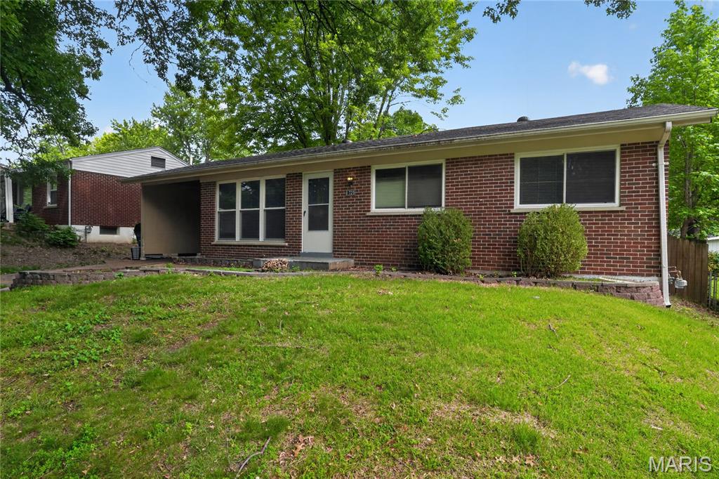 Discover an inviting single-family residence, meticulously maintained and ready for immediate occupancy, located at 1729 Foley DR, STLS MO 63136. Constructed in 1963, this property offers a seamless blend of classic design and contemporary comfort, presenting a compelling opportunity for discerning buyers. The kitchen is thoughtfully appointed with coordinating black appliances, creating a cohesive and functional space for culinary endeavors. This home features three well-proportioned bedrooms and a single, efficiently designed bathroom. An expansive basement provides significant potential for additional living space or generous storage solutions. The attached carport offers convenient and sheltered parking.
