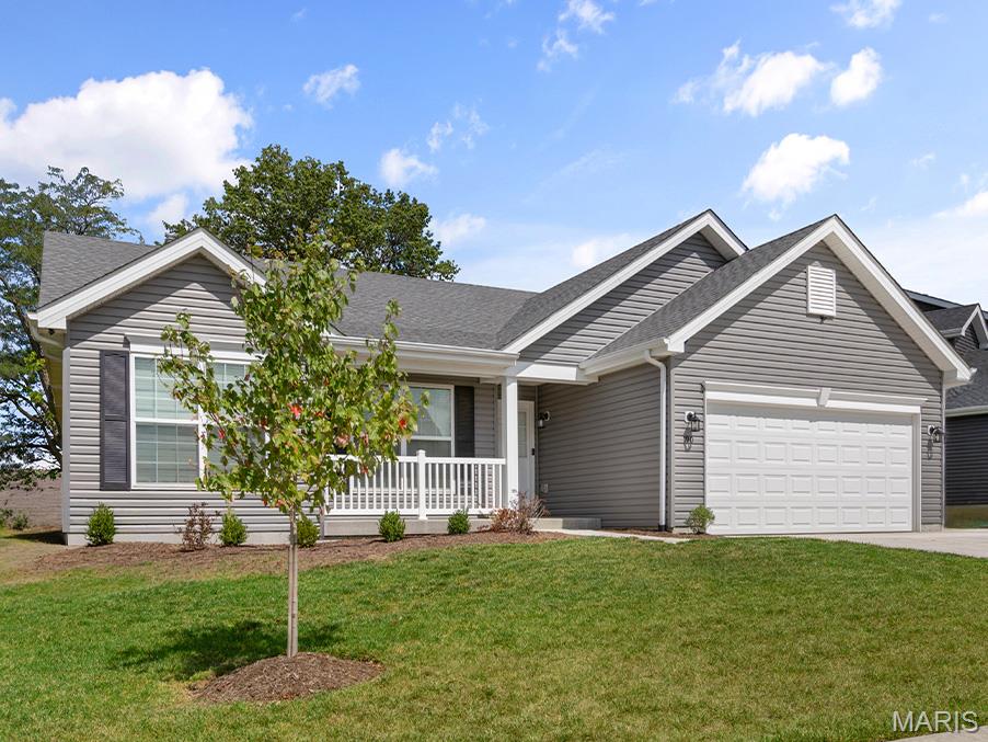 Hickory 3BR, 2BA ranch move-in ready this winter by McBride Homes! This open floorplan features beautiful wood laminate flooring, vaulted ceilings & 6ft windows. The kitchen boasts level 3 42” Benton Sarsaparilla, quartz countertops, stainless steel GE appliances, & a walk-in pantry. Spacious dining area w/sliding doors to the backyard. The great room offers a ceiling fan & 2 windows for natural light. Primary suite includes a large walk-in closet & private bath with double vanity, large tub with a window, a walk-in shower, & linen closet. Two additional bedrooms w/ ceiling fan prewires, plus hall bath and linen closet. Extras include: 2 panel interior doors, main floor laundry, and ¾ bath rough-in at lower level for future finish! Windswept Farms offers Rockwood Schools, Jeff Co taxes, and great onsite amenities! Enjoy peace of mind with McBride Homes' 10 year builders warranty and incredible customer service! Similar photos shown.