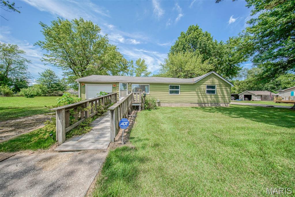 Investment opportunity in the heart of St. James! This 2-bedroom, 1-bathroom bungalow sits on just over a half-acre lot and features an attached 1-car garage. With great potential for a dreamy transformation or to expand your rental portfolio, this property is priced to sell. Conveniently located near local amenities, schools, and parks in an established neighborhood. Generously sized rooms, mature trees, a level yard, and much more! Don’t miss your chance to bring this diamond in the rough back to life! Schedule your private showing today.