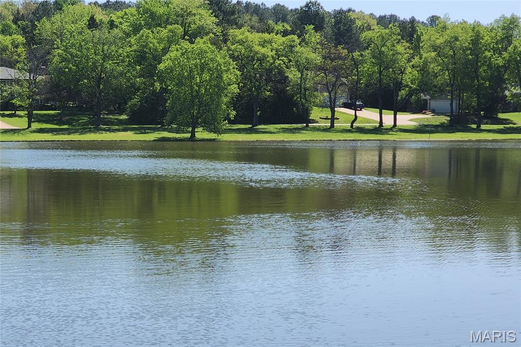 Welcome to Evergreen Lakes in Catawissa!  Bring your builder, your plans, and your vision to create the home you've always wanted. The 0.258 acre lot at 3906 Red Bud Drive offers an ideal setting for a primary residence or a weekend retreat. Need more space for bigger dreams? You can also expand your canvas to include the neighboring lot at 3910 Red Bud Drive for a total of just over a half of an acre. This private community has 3 lakes where you can cast a line and wait for the fish to bite, or simply enjoy the natural surroundings. Electric and community well water available. Located in the Meramec Valley School District with Nike Elementary right down the road. It’s a short 10 minute drive to Pacific. Each lot is listed for $8,000 or $16,000 for the pair. Seller is a licensed real estate broker in Arizona.