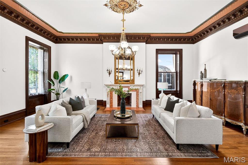 PRICE IMPROVED! 4341 Westminster Place #1 offers a rare opportunity to own a fully renovated historic condominium in the heart of the Central West End’s Cathedral Square neighborhood. Set within an exclusive boutique condo building with only two private residences, this 5,157-square-foot home blends the privacy of a grand historic residence with the ease of luxury condominium living. Designed in 1895 by Barnett, Haynes & Barnett - the celebrated architects behind the Cathedral Basilica - the residence is a masterpiece of craftsmanship, romance, and modern refinement. Along one of the Central West End’s most enchanting boulevards, the past and present dance in perfect harmony. A sweeping tiger oak staircase and jeweled stained glass greet you at the door, casting a spell of timeless elegance. At its heart, a reimagined chef’s kitchen shimmers with Calacatta gold marble, a grand walnut island, and a butler’s pantry - a space where gatherings feel both intimate and extraordinary. Everywhere, historic craftsmanship and modern comfort blend seamlessly. Intricate woodwork, glowing stained glass, seven fireplaces, and storied architectural details whisper of another era, while fresh renovations make the home as effortless as it is breathtaking. The residence offers four bedrooms, marble-clad bathrooms, a walk-in dressing room, and a convenient second-floor laundry room. Outside, through the gated driveway, a new detached garage provides two dedicated parking spaces and access to a shared pool, an exceptional luxury in the heart of the city. 4341 Westminster is where history is treasured, privacy is protected, memories are born, and life unfolds with uncommon grandeur - moments from Euclid’s vibrant shops and restaurants, Forest Park, universities, hospitals, and the very best of the Central West End.