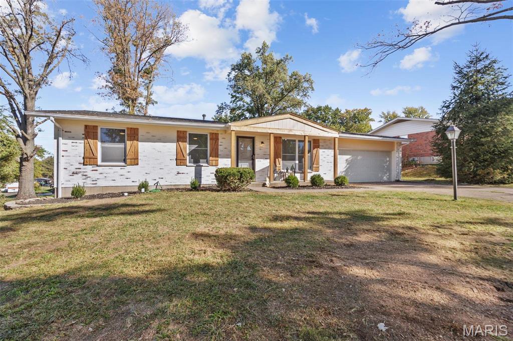Welcome to this beautifully remodeled 3-bedroom, 2-bathroom ranch-style home! Nestled in a quiet, family-friendly neighborhood, this home offers a seamless blend of modern updates and timeless charm. The open-concept living area is filled with natural light, featuring hard wood flooring, fresh paint, and stylish fixtures throughout. The gourmet kitchen boasts brand-new stainless steel appliances, sleek quartz countertops, and custom cabinetry, perfect for entertaining. Each bedroom is generously sized, with great closets. Both bathrooms have been completely updated with contemporary finishes, including new vanities, and fixtures. Location, location - Parkway C-2 school district with easy highway access and such a great central location! Walking distance to elementary school. CALL NOW!
