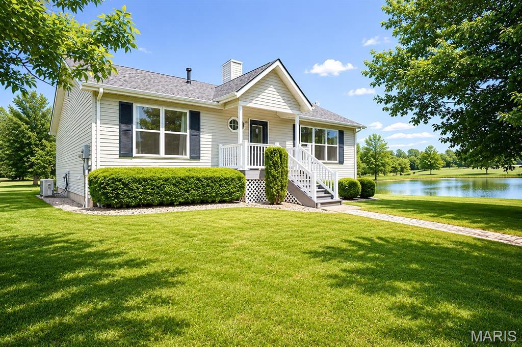 Privacy, nature, and convenience come together in this beautifully maintained home situated on over 2 acres in Edwardsville. Tucked away in a peaceful setting, the property backs to a stocked pond and offers direct access to the MCT bike trails, making it perfect for those who enjoy the outdoors while still wanting to be close to town.
Inside, you'll find vaulted ceilings, large windows that fill the home with natural light, and a warm, inviting layout that's truly move-in ready. The finished walkout basement provides additional living space ideal for entertaining, a family room, home office, or guest area.
Step outside to enjoy the composite deck and hot tub while taking in the scenic views and private surroundings. A two-car garage, brand-new roof, and pride of ownership throughout make this home a rare opportunity to enjoy the best of both worlds—peaceful country-like living with the convenience of Edwardsville amenities just minutes away. Buyer or buyer's agent to verify all MLS info