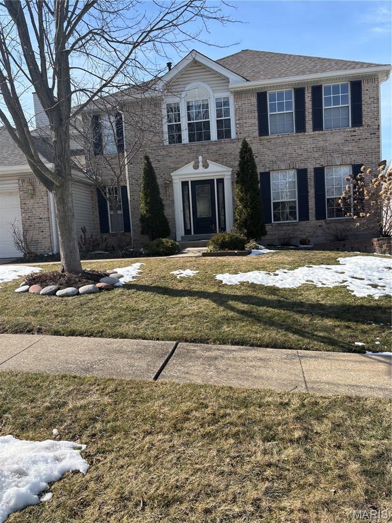 This two-story home offers five bedrooms and four baths, with approximately 3,352 square feet of finished living space across three levels. Ideally located in the heart of a sought-after neighborhood, the property backs to a scenic subdivision lake with fountain views. The newer center-island kitchen features quartz countertops, cherry-tone cabinetry, stainless steel appliances, and a planning desk; the primary suite includes a tray ceiling, tiled shower with glass door, double vanities, and a large walk-in closet. The upper level provides four bedrooms and two full baths, while the walkout lower level includes a recreation room, playroom, fifth bedroom, and bath. Additional amenities include a wood deck, paver patio, main-floor laundry, wood, tile, and luxury vinyl tile flooring, a gas fireplace, and a sprinkler system. Notable updates include a two-year-old roof; basement drywall (2024); primary bath update (2021); new flooring throughout much of the home (2019); patio door (2018); primary closet (2017); south-facing bedroom windows (2014); and kitchen, bath, family-room wood flooring, and mudroom tile (2013). Located in the Parkway North School District, just down the street from Craig Elementary, with convenient access to highways, shopping, and restaurants. Welcome!