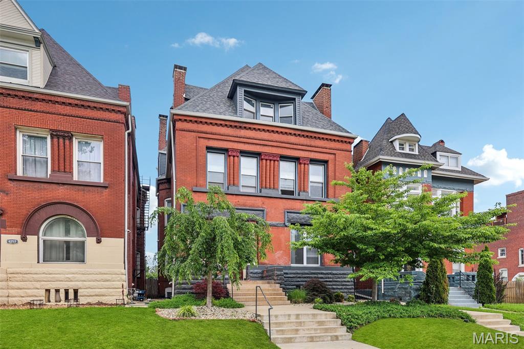 A masterful blend of historic architecture and contemporary design, this stunning residence is one of only four boutique condominiums created from the meticulous transformation of a distinguished three-story Central West End building. Offering nearly 2,500 square feet of sophisticated living space, this four-bedroom, three-bath home delivers exceptional scale, style, and comfort in one of St. Louis' most coveted neighborhoods.

The dramatic main living area showcases soaring ceilings, rich hardwood floors, and expansive windows that flood the home with natural light. An open-concept design creates effortless flow between living, dining, and entertaining spaces, while an upper-level loft retreat provides additional flexibility with a private bedroom suite ideal for guests or a home office.

Designed for both everyday living and elevated entertaining, the chef-inspired kitchen features custom cabinetry, granite countertops, a substantial center island, stainless steel appliances, a six-burner gas range, and generous dining space framed by sweeping city views.

The luxurious primary suite serves as a private sanctuary, complete with a spacious walk-in closet and a spa-caliber bath featuring dual vanities, an oversized glass-enclosed shower, and a relaxing soaking tub.

Additional highlights include two private outdoor terraces, in-unit laundry, assigned parking, and thoughtfully curated updates throughout. Perfectly situated in the heart of the Central West End, with views of the Arch downtown and the Cathedral Basilica to the south, moments from the fun and fabulousness of the CWE, Washington University Medical Campus,  BJC, SLU, premier dining,  and shopping.  This exceptional home offers a rare opportunity to experience historic character reimagined through a modern luxury lens.