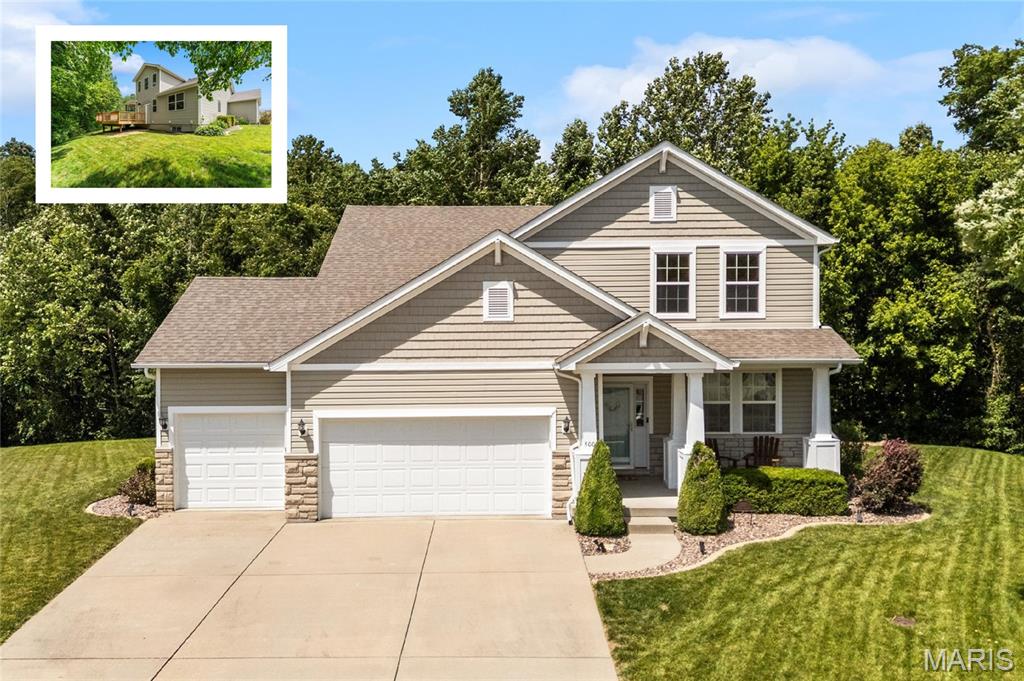 Wonderfully maintained 4 bedroom, 3.5 bathroom home on a quiet cul-de-sac street in Windsor Creek Subdivision.  This 1.5 story home features wood floors throughout most of the main level and custom upgrades such as larger baseboards and crown moulding. The main level is open and inviting with 9 ft ceilings and a two-story great room.  The eat-in kitchen features granite counters, a breakfast island with stone, pantry and stainless appliances.  It also provides access to the new deck and private wooded backyard.  The great room features a wall of windows and fireplace.  The main level primary suite has a spacious bathroom with double sink, shower, soaking tub and large walk-in closet.  A home office, laundry room and half bath complete the main level.  Upstairs there are two generously sized guest bedrooms, a hall bath and additional family room/loft area perfect for a playroom for kids.  The lower level is a showstopper with LVP flooring and custom cabinetry. A family room with built-ins and custom wet bar with quartz counters provide endless opportunities to entertain.  There is also a 4th bedroom, full bath and bonus area serving as a second home office.  New Roof (2025), New Single Garage Door (2026)