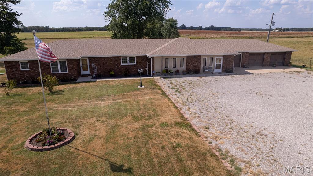 Unique Phillipsburg Estate on 4 Acres with 3-bedroom,4 bath brick home, massive primary suite,and loads of parking! Discover a property with endless potential in the highly sought-after Conway School District. Immediate access to I-44 makes your morning commute a breeze! Nestled on 4 private acres, and surrounded by farmland this 2,760-square-foot brick home has been meticulously maintained, and offers the ultimate in space and potential. The crown jewel of this estate is the massive 36x22 primary bedroom. Designed for ultimate comfort, it features an adjoining 1/2 bath and a sound-dampening ceiling from its past life as a music jam room. Currently utilized as a quilting area, this expansive space offers a rare opportunity for a home-business, creative studio, or an unmatched private retreat. Daily living is made effortless with a clever layout, including a great separated 1-car garage designed for ease of unloading into the massive pantry. The other 2-car garage ensures you have room for all your vehicles, tools, and toys. Relax year-round in the fully heated, and cooled sunroom, or step outside to the large deck and over look the homestead of your dreams. Green thumbers will love the dedicated greenhouse, and an outdoor watering system routed directly to above-ground garden beds. Large back yard also offers additional storage building and 2 detached 1car garages. This one won't last! Schedule your showing today!