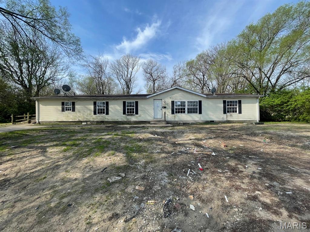 Discover an excellent opportunity at 1918 Boismenue in East St. Louis—a property full of potential for investors or buyers ready to bring their vision to life. This home offers a functional layout with defined living spaces, providing a solid opportunity for renovation or customization. Step inside to find a traditional floor plan that includes a living area, kitchen, and multiple bedrooms, allowing flexibility for a variety of living arrangements. Whether you're looking to create a comfortable primary residence or expand your investment portfolio, this property presents a value-driven opportunity with room for improvement. Situated in an established neighborhood, the home is conveniently located near local schools, everyday shopping, and dining options, with quick access to major roadways and nearby communities. Just minutes from St. Louis, you’ll enjoy proximity to employment hubs, entertainment, and cultural attractions while still benefiting from a more affordable market. ALL information is deemed reliable but is not guaranteed and should be verified by the buyer and/or buyers agent before making an offer.