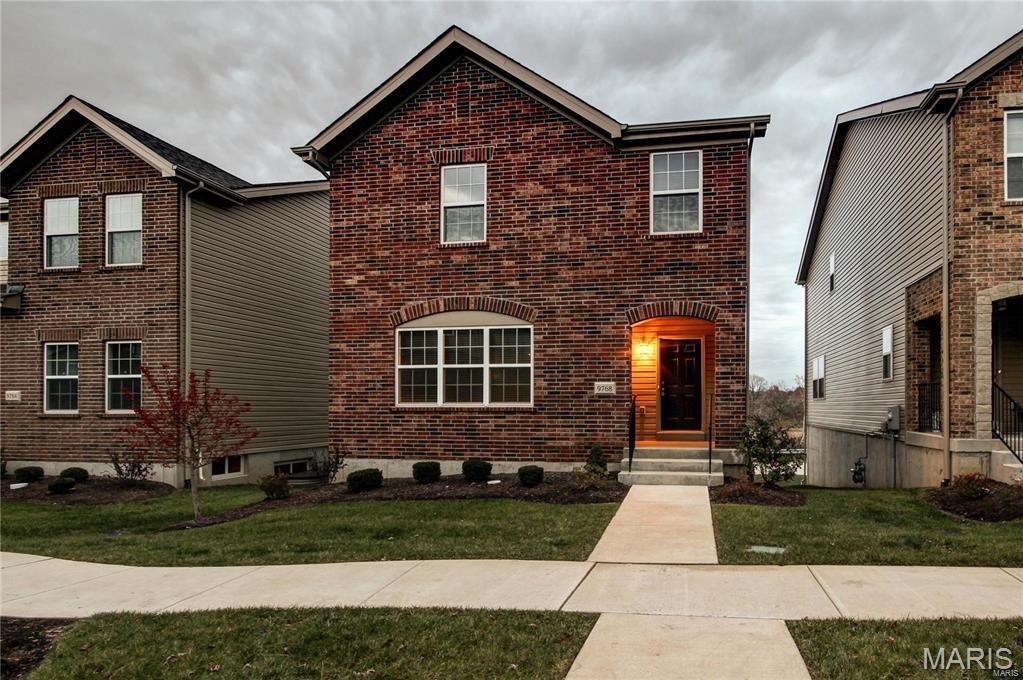 Here's your opportunity to live in a great new community! This three bedroom, two and half bathroom home is in a great location just moments from Grant's Farm, schools, Grant's Trail, and the new St. Louis County Library branch. You'll love the spacious, open layout that's perfect for entertaining! A large living room takes you to the family room and beautiful kitchen with stainless steel appliances, granite counters, 42" cabinets, and a breakfast bar! The kitchen leads into the dining room. A half bathroom rounds out the space. Upstairs, you'll find convenient 2nd floor laundry, a master suite, plus two more large bedrooms and another full bathroom. The back deck overlooks the pond and common ground -- a wonderful view! Don't miss out on this wonderful home!