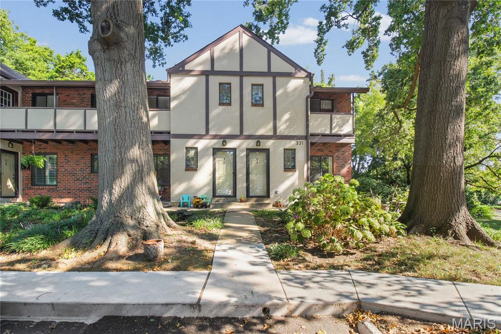 Dreaming of living in Historic Downtown Kirkwood where you are just minutes from Kirkwood Park, endless restaurant options, farmers markets, coffee shops, and local shopping? NOW is your chance! This 1 bedroom 1 bathroom end unit is ready for you to move in. Inside, you are greeted with a beautiful stained glass window and original slate tile. in the living room, you have a wide open space that features fresh, plush carpet. The living room flows directly into the kitchen that showcases brand new floors. That same entryway slate tile is found in the bathroom, giving the space a beautiful pop of color. In the bedroom, you will have that same brand new carpet, a spacious closet, and walk-out access to a private patio and common ground. This unit also features a fully finished basement, allowing for an office, home gym, or whatever suits your lifestyle! From the basement, you'll also have access to a dedicated and secured storage space. 331 Barrington Square Estates is ready for YOU! Call today! Comes with passed occupancy!
