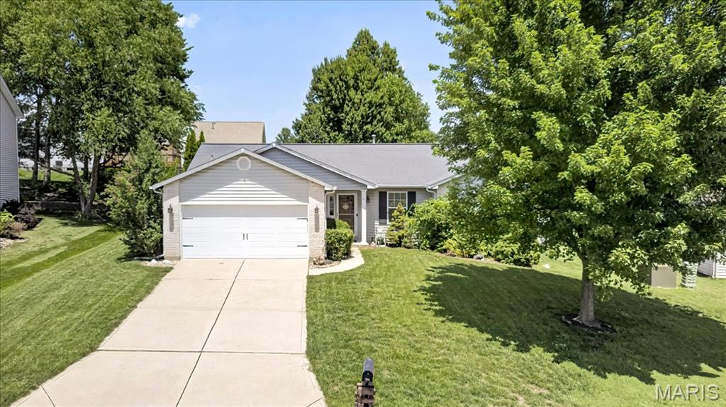 Welcome home! As you step inside this adorable open concept home, you are greeted by the light and bright family room that includes a beautiful wood burning fireplace. The updated kitchen flows into the breakfast room complete with a bay window. The spacious vaulted primary bedroom includes an attached full bathroom and walk-in closet. Two generously sized bedrooms and full bathroom round out the rest of the main floor. Outside is the patio and fully fenced yard (2021) perfect for entertaining. Don't forget the attached two car garage and main floor laundry that add to this homes conveniences . This house is walking distance to Castlio Elementary and has easy highway access. Come check it out today!