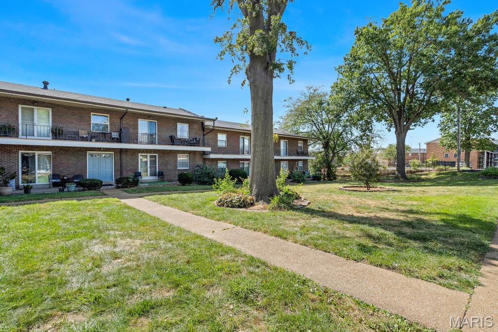 Welcome home to this stylishly updated main floor 2 bedroom, 1 bathroom condo! Enjoy your own attached front patio, perfect for morning coffee. Step inside to a bright living room that flows seamlessly into the dedicated dining space. The updated kitchen boasts sleek granite countertops and a convenient pass-through breakfast bar/window-perfect for entertaining! Featuring beautiful luxury vinyl plank flooring throughout! Down the hall, you'll find a spacious primary bedroom, a comfortable second bedroom, an updated bathroom and in-unit washer and dryer! Steps away from the community pool, with 1 assigned parking space nearby and guest parking available. Private basement storage unit included (first on the right, #23). Seller offering 6 months of HOA coverage!