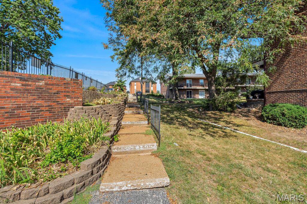 Colonial Woods Condo - Residential