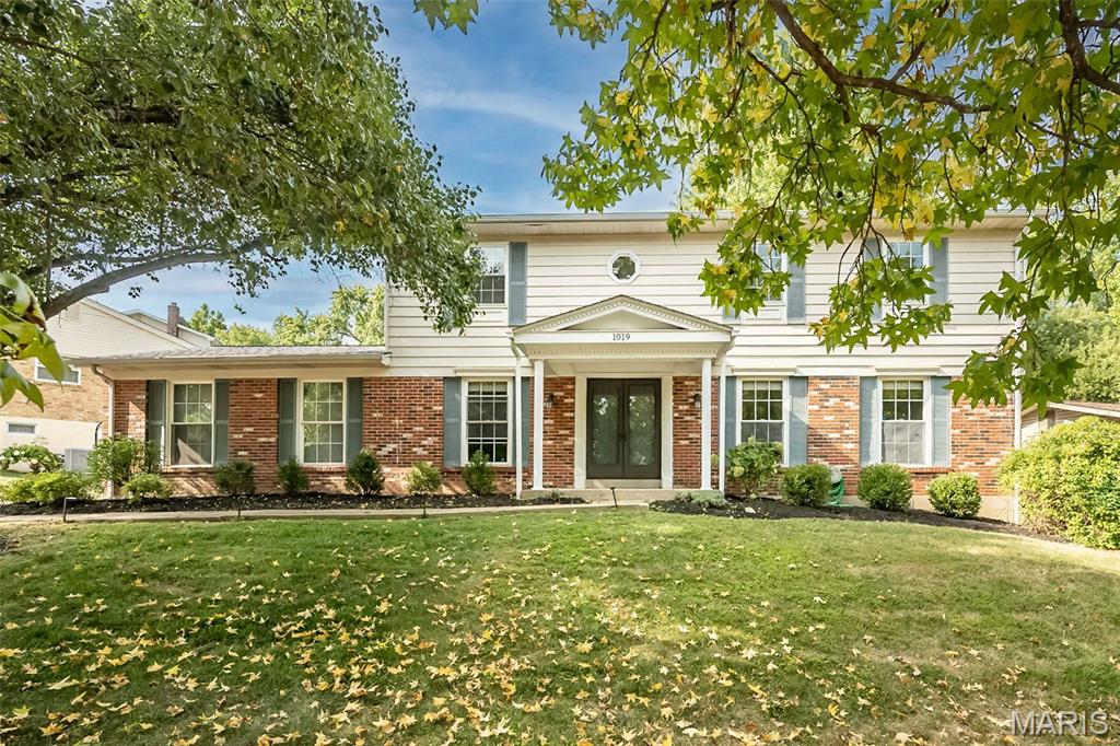 Welcome to Fox Creek Estates, where timeless character meets thoughtful updates in this beautifully appointed 5-bedroom, 2-story home in the heart of Ballwin. Gorgeous hardwood floors flow throughout much of the main level, beginning with a welcoming entry flanked by spacious living and dining areas and continuing into an inviting family room anchored by a classic fireplace and French doors overlooking the backyard.

The beautifully updated kitchen is a standout, featuring crisp white custom cabinetry, quartz countertops, stainless steel appliances, subway tile backsplash, generous prep space and a large center island that creates a natural gathering place for everyday living and entertaining.

The upper level is home to all five bedrooms, including a spacious primary suite with a large walk-in closet and beautifully renovated private bath featuring an oversized tiled shower, updated vanity and contemporary finishes. Four additional generously sized bedrooms and an updated full hall bath complete the second floor, offering an impressive amount of bedroom space all on one level.

The partially finished lower level adds even more versatility with an expansive recreation space ready for movie nights, a game room, home gym, hobby space or whatever fits your lifestyle, while still providing additional storage.

Outside, enjoy a generous backyard with mature trees, patio space and plenty of room to relax, play or entertain. An attached 2-car garage adds everyday convenience.

All of this is tucked within sought-after Fox Creek Estates, just minutes from shopping, dining, nearby parks and recreation, major commuter routes and Parkway West Schools. Classic West County charm, beautifully updated spaces and room to spread out! 1019 Parkwatch Drive is ready for its proud new owner!