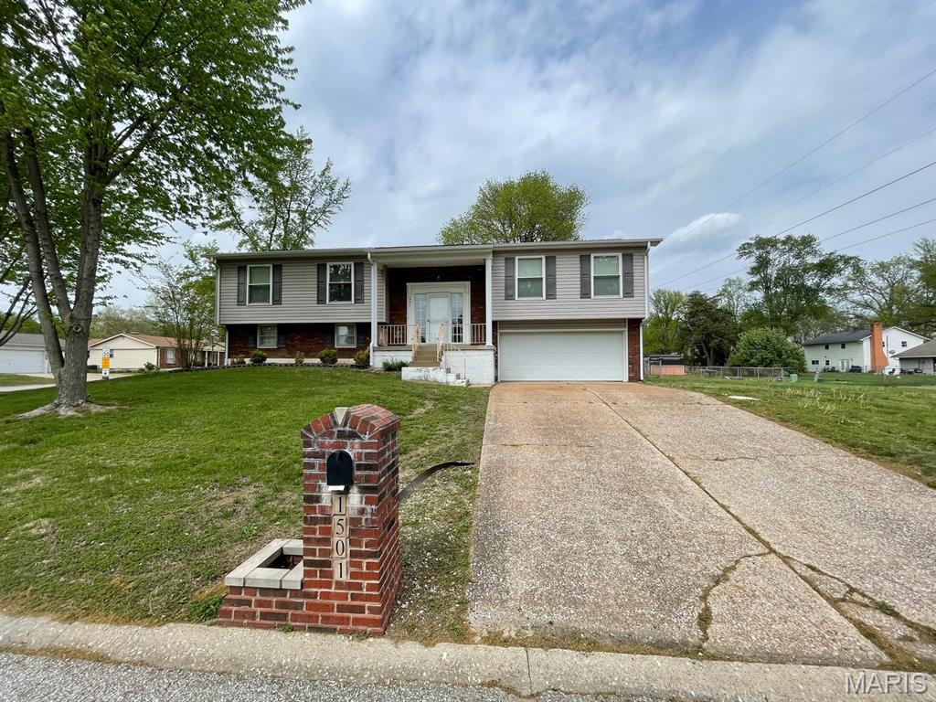 Welcome to 1501 Vicksburg Drive, a spacious 4-bedroom, 2.5-bath home nestled in an established Belleville neighborhood offering a convenient location close to everyday amenities. Step inside to an inviting open floor plan designed for comfortable living and entertaining, featuring bright and connected living spaces filled with natural light. This home is ready for your personal updates and design ideas. Large windows bring in natural light throughout the home. The finished basement adds valuable additional living space with a secondary living room perfect for a den, recreation area, home office, or media space. Outside, the sizable yard provides plenty of room for outdoor gatherings, gardening, or relaxing evenings at home. Whether you are a first-time buyer, investor, or someone looking for a home to customize, this property offers incredible potential. Conveniently located near shopping, restaurants, parks, schools, and major highways, commuters will appreciate the quick access to downtown Belleville, Scott Air Force Base, and the St. Louis metro area. Enjoy nearby community amenities, local dining, and the small-town charm Belleville is known for, all while making this property your own. ALL information is deemed reliable but is not guaranteed and should be verified by the buyer and/or buyers agent before making an offer.