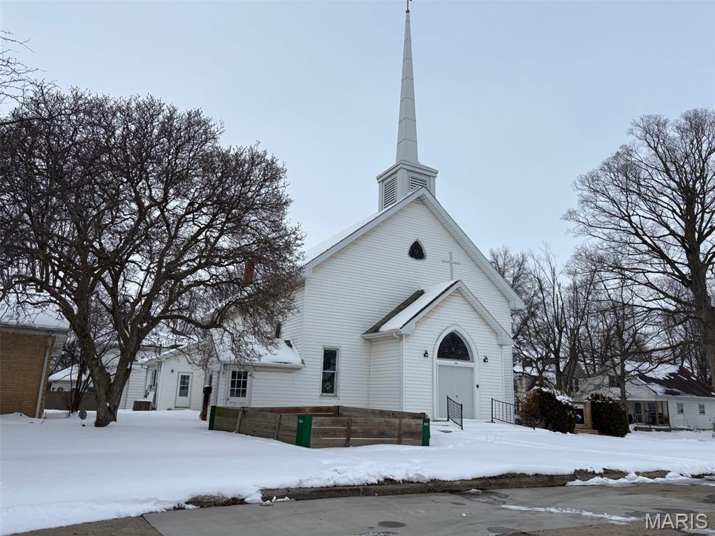 This distinctive former church offers a rare opportunity to own a one-of-a-kind structure rich in character and architectural presence. The property features a spacious open sanctuary with high ceilings, large windows that fill the interior with natural light, and original design elements that reflect its historic purpose.

The layout provides a versatile canvas suitable for a wide range of potential uses, including community space, event venue, studio, office conversion, or residential redevelopment. Additional areas may include meeting rooms, offices, and storage, depending on configuration.
There is also a large open basement area with full kitchen and restrooms.  

Located in an established neighborhood, the property offers strong visibility and convenient access to local amenities. This building is no longer an active place of worship and is being offered for sale as-is.  Wiring has been upgraded by Easterday Electrical.

Ideal for buyers seeking a unique property with architectural character and redevelopment potential.