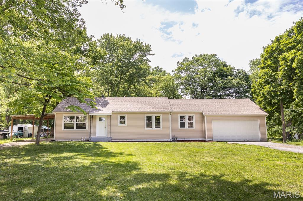 Freshly remodeled and move-in ready! This beautifully updated 3 bedroom, 2 bathroom ranch sits on a spacious 3/4-acre lot with both interior and exterior features you’ll love. Inside, you’ll find fresh paint, new flooring and a thoughtfully updated layout that now includes a private primary suite complete with a walk-in shower and large closet. The split bedroom floor plan offers added privacy and functionality, while the unfinished basement provides plenty of storage space. Outside, enjoy peaceful views from the covered deck overlooking the large backyard. The detached shed adds even more versatility and could make the perfect hangout space, hobby area or quiet home office escape. With fresh updates, a generous lot and flexible bonus space, this ranch home is ready to welcome its next owner!