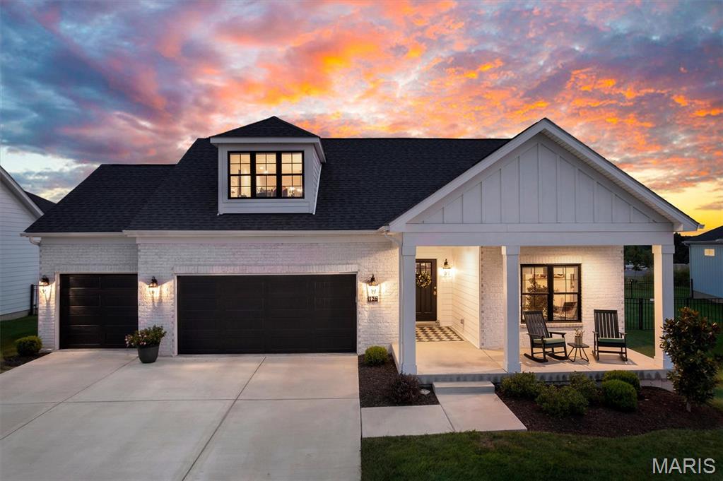 Don't miss your opportunity to own one of the largest villas in the community! This exceptional home stands out with its rare second-story bonus suite, offering the perfect space for guests, extended family, or a private retreat. Step inside to an open-concept floor plan designed for both comfort and entertaining. The spacious living room features a cozy gas fireplace and flows seamlessly into the bright eat-in kitchen. Just off the main living area, you'll find a generous home office, ideal for working from home or creating a flexible living space. The main-floor primary suite is a true retreat, complete with private access to the covered patio, a custom walk-in closet, and a luxurious en-suite bath. All bedroom closets are custom from St. Louis Closet Company and windows throughout villa are Pella. Main-floor laundry adds everyday convenience. Upstairs, you'll discover an expansive bonus living area, an additional bedroom, and a full bath—perfect for guests or multi-generational living. Outside, enjoy a fenced backyard, a covered patio, and an oversized three-car garage. Low HOA fees include irrigation, ;awn mowing and additional community amenities, making maintenance easy and affordable. With its spacious layout, premium features, and one-of-a-kind floor plan, this villa is truly one of the finest homes in the neighborhood. Schedule your private showing today!