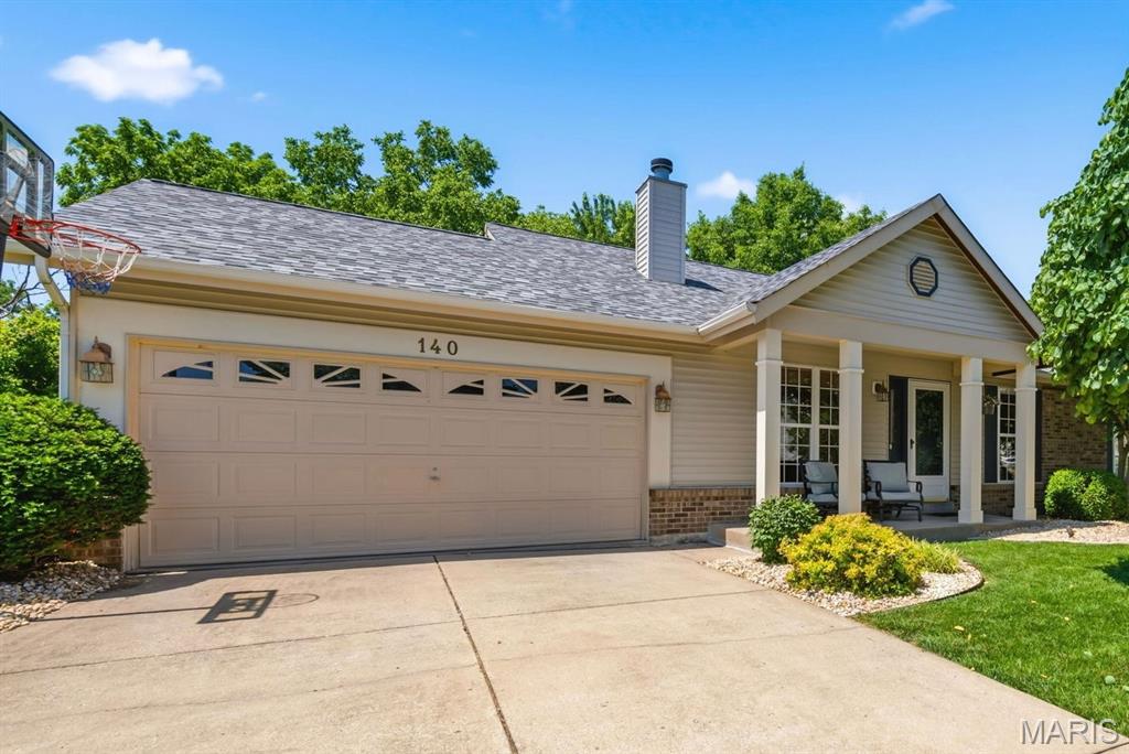 Welcome home to this beautifully updated ranch in the desirable Green Forest Estate subdivision, located in the sought-after Mid Rivers Elementary attendance area! Offering 3 bedrooms, 3 full bathrooms with finished walk-out lower level, this open floor plan blends comfort & style with convenience.
The main level features a vaulted, beamed ceiling and hardwood flooring throughout the spacious living room, dining room, and kitchen. A cozy wood-burning fireplace with classic brick surround & wood mantel creates the perfect gathering space in the living room. The updated kitchen serves as the heart of the home, showcasing granite countertops, full tile backsplash, a center island, gas range, and lots of cabinetry for storage and meal preparation. Large main floor laundry adds everyday convenience, ideally positioned between the kitchen and access to 2 car garage.

The primary suite features a vaulted, beamed ceiling, walk-in closet, and updated bathroom. Both main floor bathrooms have been thoughtfully updated with modern finishes, offering true move-in-ready appeal. Added peace of mind comes with a new roof installed in 2025 and HVAC in 2020.
The walk-out lower level provides exceptional additional living space, including a large recreation room, built-in bar area, full bathroom, and a versatile flex room with French doors- ideal for a home office, fitness room, playroom, or guest space.
Step outside to enjoy the fenced backyard backing to mature trees, creating a private and peaceful setting. Outdoor entertaining is easy with both a deck and patio, while the storage shed offers extra space for tools, lawn equipment, and seasonal storage.
Conveniently located near parks, shopping, dining, and major commuter routes, this well-maintained home offers the perfect combination of indoor comfort and outdoor enjoyment. Don't miss your opportunity to call this St. Peters gem home!