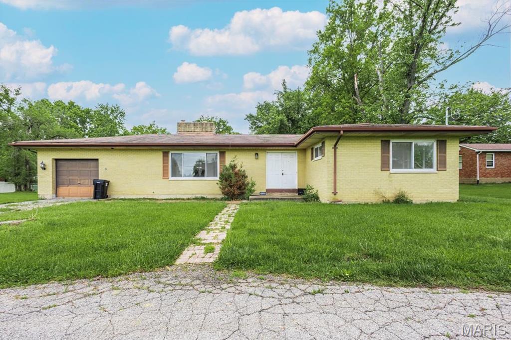 New Roof March 2026!! Calling all investors and/or rehabbers! This mid-century home is waiting for the perfect person to come in and make it everything they could want! Amazing location close to everything, beautiful level .5 acre lot just calling your name. All newer windows on property & some demo has already been done for you! This can be included with the other two lots (4536 & 4548) for a total of 3.41 acres as a package deal if you are looking to build more homes! Call with any questions & schedule your showing today! So much potential!