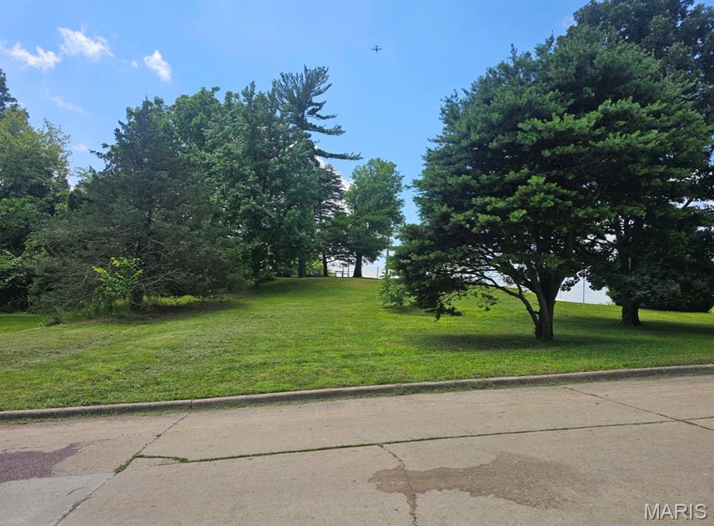 Opportunity awaits with this 0.54-acre residential lot in Cape Girardeau! Mostly cleared with only a few mature trees, this property offers a great canvas for your next project. Conveniently located near Shawnee Parkway with quick access to Interstate 55 and just minutes from downtown Cape Girardeau, you'll enjoy both accessibility and convenience. With its size, location, and development potential, this lot presents an attractive opportunity for builders, developers, and investors looking to construct income-producing rental properties. Utilities are available nearby. Don't miss your chance to secure a versatile parcel.