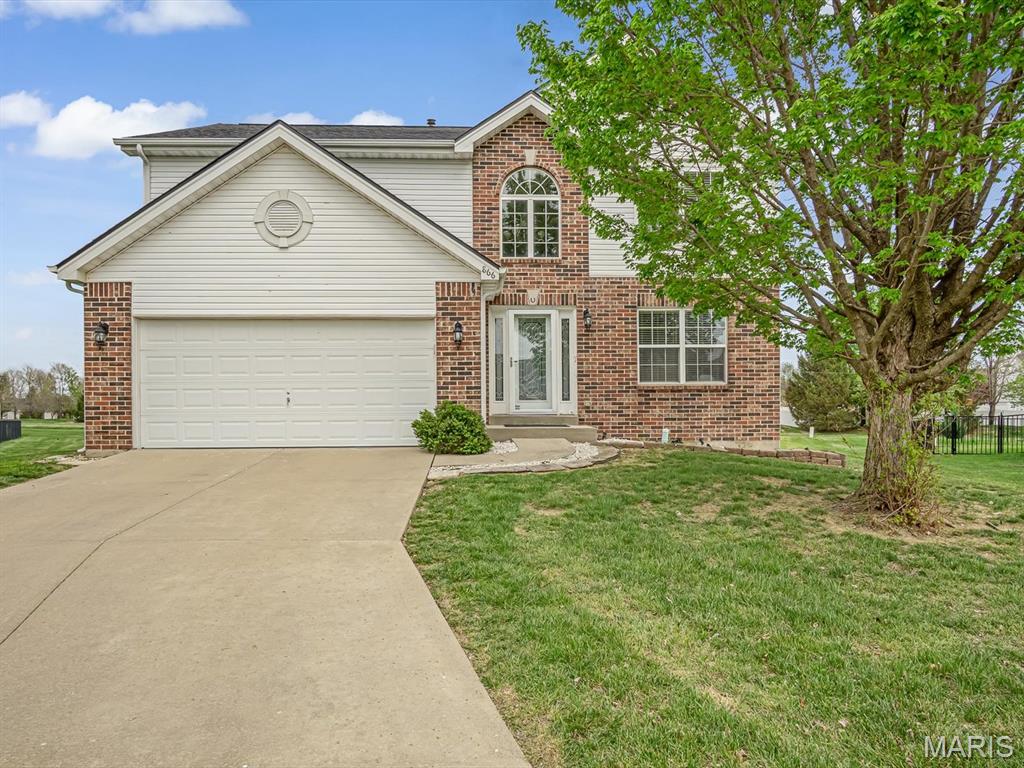 POOL NEIGHBORHOOD + CUL-DE-SAC + O’FALLON SCHOOLS! Welcome to Fountain Place, one of the area’s most desirable neighborhoods, where community amenities, a cul-de-sac setting, and a great O’Fallon School District location come together beautifully. This spacious 2-story home offers 4 bedrooms, a partially finished lower level, and a large pie-shaped backyard with room to relax, play, and entertain. Residents also enjoy access to the neighborhood pool, adding even more appeal to this wonderful location close to shopping, schools, and Scott Air Force Base. Inside, the main level offers comfortable everyday living with a family room, separate dining room, powder room, and an eat-in kitchen designed for both function and charm. Highlights include stainless steel appliances, a built-in desk area with cabinetry, and a corner sink perfectly placed beneath windows overlooking the backyard. Upstairs, you’ll find all 4 bedrooms, including a private primary suite with walk-in closet and full bath, while the additional bedrooms share a full hall bath. The partially finished lower level adds flexible bonus space with 2 finished rooms ideal for a home office, hobby room, workout area, or gaming space, plus a bath rough-in and unfinished storage/laundry area. Washer and dryer are included. A new roof was installed in 2025, and siding is scheduled to be replaced, offering added value for the next owner. Car charger does NOT stay. Siding being replaced.
