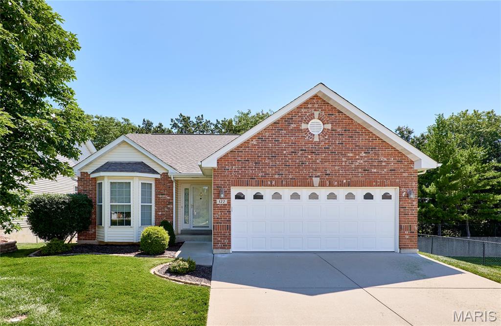 Welcome to this beautifully maintained detached villa offering an open, inviting layout and versatile living spaces throughout.

Main floor laundry is conveniently located as you enter from the garage, and all appliances remain for a move in ready experience. The open floor plan features vaulted ceilings that enhance the natural light and spacious feel. 

The kitchen includes a bright breakfast area that leads to an enclosed patio/sunroom and continues out to a deck, offering privacy and peaceful views of mature trees in the backyard. Inside, the living room features a cozy fireplace, and the dining area flows seamlessly within the open main living space.

The primary suite includes a walk in closet, a bathroom with dual sink vanity, shower, and additional large closet space. A secondary bedroom and full bathroom complete the main level.

The finished basement expands your living space with a family room, second fireplace, and mini bar. A third bedroom and full bathroom complete the lower level, along with additional unfinished space ready for storage or future customization. A walk out sliding door provides easy outdoor access.
New Water heater 2023, New HVAC 2025.