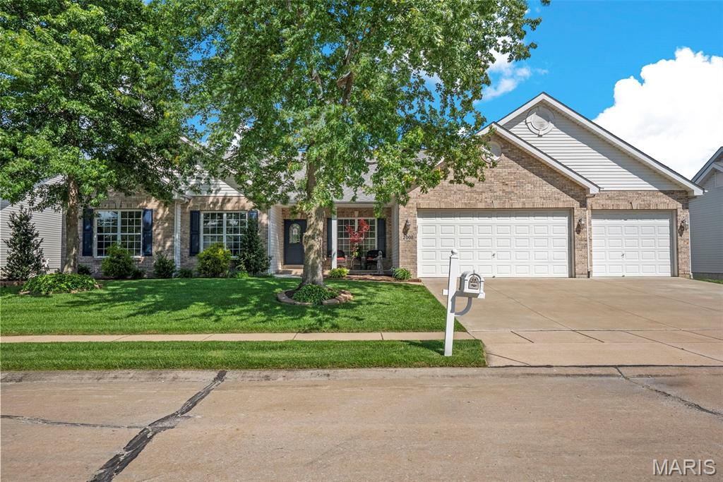 Welcome to this stunning 3-bedroom, 3.5-bath open-concept ranch nestled in the heart of downtown Cottleville. Designed for both comfort and entertaining, this home features a spacious floor plan filled with natural light, vaulted ceilings, and seamless flow throughout the main living areas.

The oversized garage offers incredible storage and functionality with enough room to accommodate a boat, additional vehicles, or a workshop setup. A standout feature of the home is the expansive 300-square-foot four seasons room — the perfect space to relax year-round while enjoying views of the backyard in every season.

Located just minutes from Cottleville’s charming shops, restaurants, parks, and walking trails, this home combines small-town charm with modern convenience. Whether you're hosting guests or enjoying a quiet evening at home, this property offers the perfect blend of space, style, and location.