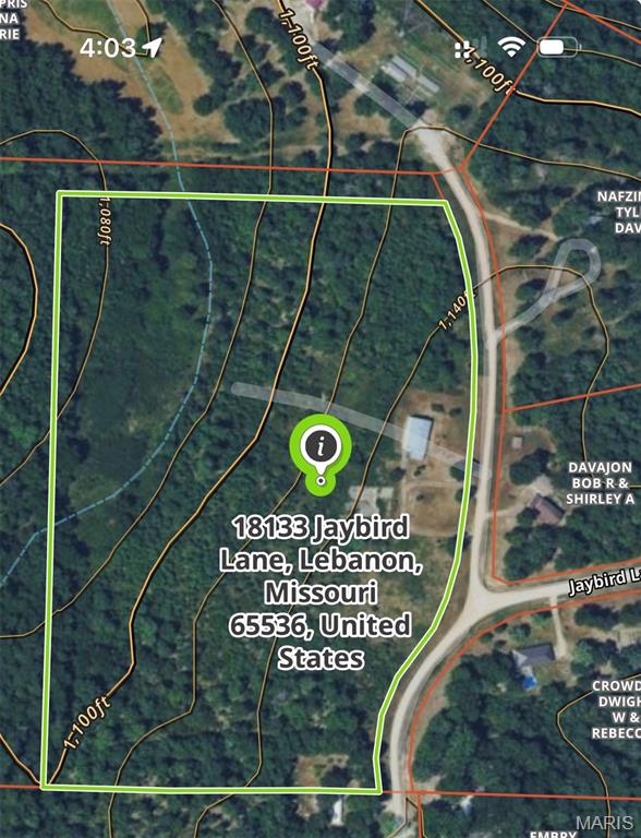Twenty acres. Two potential living space. One property filled with possibilty.  Located between Lebanon and Camdenton, this versatile 20-acre property offers the space to spread out, create something of your own, and enjoy country living while remaining whithin reach of both communities. Whether you envision a private homestead, recreational retreat, hobby property, or a place where you can live while building your future home, the acreage gives you room to bring that vision to life. The property includes a shop building with partially-finished living quarters featuring a kitchen, bathroom, one conforming bedroom, and additional nonconforming rooms that could provide sleeping space, an office, storage, or hobby areas. Move in, settle into the space, and make it your own while deciding what comes next. With living space and plenty of room for projects, equipment, and storage, this building offers flexibilty that is difficult to find.  A separate concrete walkout foundation with 2-car garage originally intended for a home, creates another opportunity with its own water and electric service already in place. Build a spearate residence while continuing to use the existing building as a shop, workspace, guest quarters, or additional flex space.  With 20 acres, existing living quarters, a substantial shop, and a head-start toward a future home, much of the groundwork is already here. Bring your plans, your creativity, your vision, and then turn this county property into the home, retreat, or homestead of your dreams!