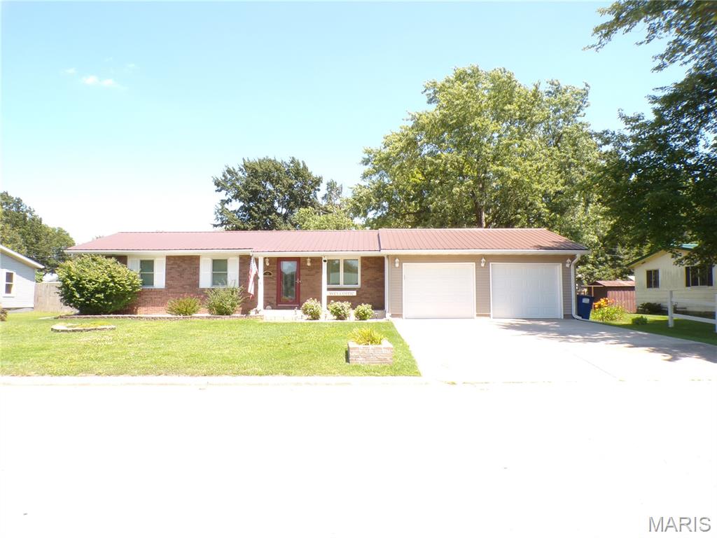 A quarter acre of land, and a massive amount of updates since it was last purchased, this 2 Bedroom, 1 Bath home awaits your dreams. Whether you are just jumping into the homeowners role for the first time or if you are downsizing, this home is just for you. Besides a new metal roof, the owners have updated the furnace/air conditioner and hot water heater. All but 2 of the windows including the picture window have been replaced. The sliding glass door, entry door and the garage doors as well as the gutters have all been replaced. The dishwasher and Samsung electric range have been purchased in the past two years. A large concrete patio and Gazebo grace the back of the home and provide private living and entertainment area. The owners had the property surveyed and added a 12 X 10 storage shed and a wooden security fence which updated the entire look of the property. Make sure to take time to see this property. So much is new and waiting for you. Call Today.