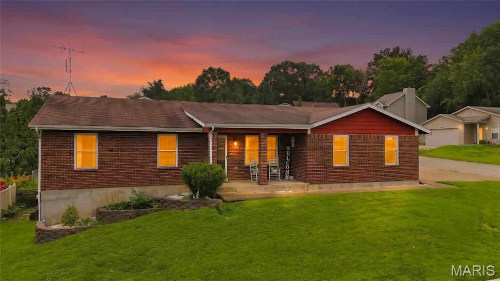 Welcome home to this beautifully designed corner lot, 3-bedroom, 3 full-bath residence featuring a covered porch, an open-concept floor plan perfect for everyday living and entertaining. The spacious great room boasts soaring vaulted ceilings, creating a bright and inviting atmosphere with newer carpeting and updated fixtures. The well-appointed kitchen and dining combo flows seamlessly into the large great room with French door with built-in blinds, offering both functionality and style. The kitchen/dining combo features a bay window, newer appliances, and a pantry. Main floor Laundry! The primary bedroom features a walk-in closet, private full bath and walk-out access, does need some tlc. While two additional bedrooms and full bathroom provide ample space for any buyer. The walk-out basement features a bonus room with a walk-in closet and full bathroom featuring a stand up shower and storage shelves. The basement also offers plenty of space for storage including built in solid wood shelfs. Deck was removed two months ago. Enjoy the comfort, versatility, and thoughtful layout this home offers, all designed to accommodate today's lifestyle. Don't miss your opportunity to make this cozy ranch your new home!