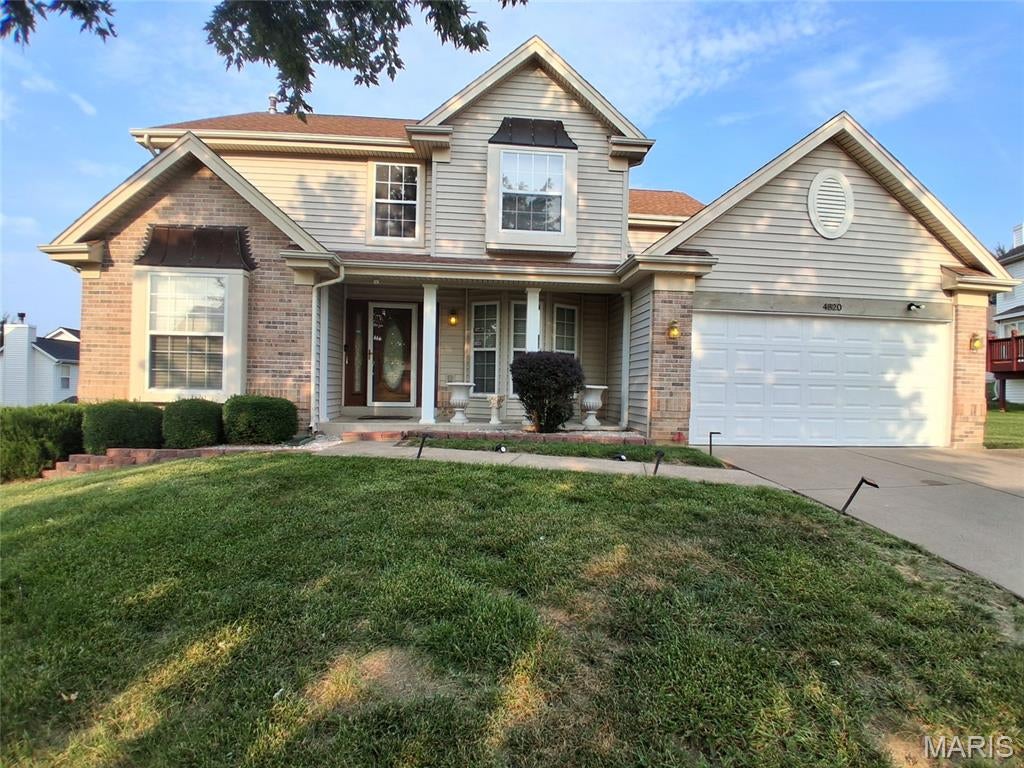 Discover a lifestyle of comfort and relaxation at 48XX Country Lane Woods, Florissant, MO. This is where you stop the car, as this is where "home is".  Constructed in 2001 in the Stone Gate subdivision with the serene, park like scenary.  
This two story home has a lot of amenities and possibilities to explore.  Some stainless steel appliances and plenty of space, closets, and comforts of home. 
Upon entry, the T-stair case captures your attention with it's beautiful wood and decorative spindles.  Master bedroom suite has a universal tub with jets and separate shower. A boastful huge deck with patio doors entrance from the family room and kitchen. The walkout basement leads to a patio with a picket fence, is partially finished and ideally can be turned into in-law quarters or entertaining with your updates.
Make an appointment to see this gem!!