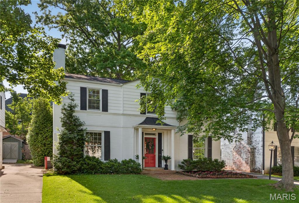 Nestled in the highly sought-after Colonial Park neighborhood, this charming painted brick Colonial offers the perfect blend of character, space, and convenience. Just a short walk to downtown Clayton and the shops and restaurants of Colonial Marketplace, the location is unbeatable. Inside, you’ll find a warm and inviting two-story home featuring 4 bedrooms and 3 full baths. The bright, sun-filled kitchen and breakfast room offer abundant cabinetry, generous counter space, and new appliances. A spacious family room addition with a bay window and opens to a brick patio and private backyard-ideal for relaxing or entertaining. The main floor also includes a versatile room well-suited as a playroom or private home office. Upstairs, the lovely and large primary bedroom features two large closets, accompanied by three additional spacious bedrooms and two full baths. Additional highlights include a 2-car garage(a real bonus), newer roof, and updated systems, offering both comfort and peace of mind-all this plus Ladue Schools. A wonderful opportunity to own a beautiful home in one of Ladue's most desirable neighborhoods!