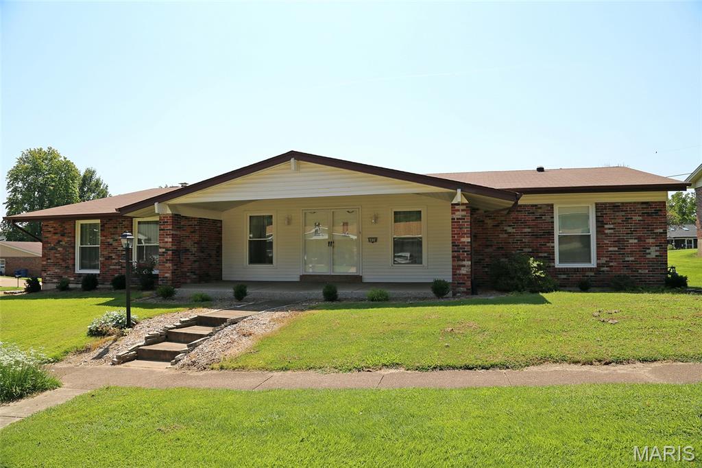 Welcome home to this spacious ALL BRICK ranch home featuring 3 bedrooms & 2 full baths. Your (28x10) covered front porch with exposed aggregate is just the beginning. Upon entering the home, you will find a hardwood entryway with a separate living room & dining room, both featuring hardwood floors & crown molding. Entertain all your guests in the family room with beamed ceilings, solar tube, hardwood floors, crown molding & a wood-burning fireplace.  Just off the family room is a (13x12) screened-in porch overlooking your level backyard; a perfect place to read a book or enjoy your morning coffee. Your newer kitchen features golden oak cabinets with under cabinet lighting, double stainless sink, a new microwave, built-in Bosch dishwasher, new disposal, solar tube & a large window overlooking the backyard. All bedrooms have hardwood flooring & overhead lighting. The master bedroom includes a double closet & an additional (6x4) walk-in closet with wire shelving.  Your master bath has been recently updated with ceramic flooring, new vanity & a walk-in shower. The hall bath updated in (2020) features ceramic flooring & a solar tube. The full basement has endless possibilities, plenty of storage & shelving. Additional features include: roof (2017) HVAC (2018) water heater (2022) windows (2023) master bedroom & basement windows (2017-Andersen). Located in a quiet, well-established neighborhood in the top-rated Lindbergh School District. Schedule a showing today before this one gets away.