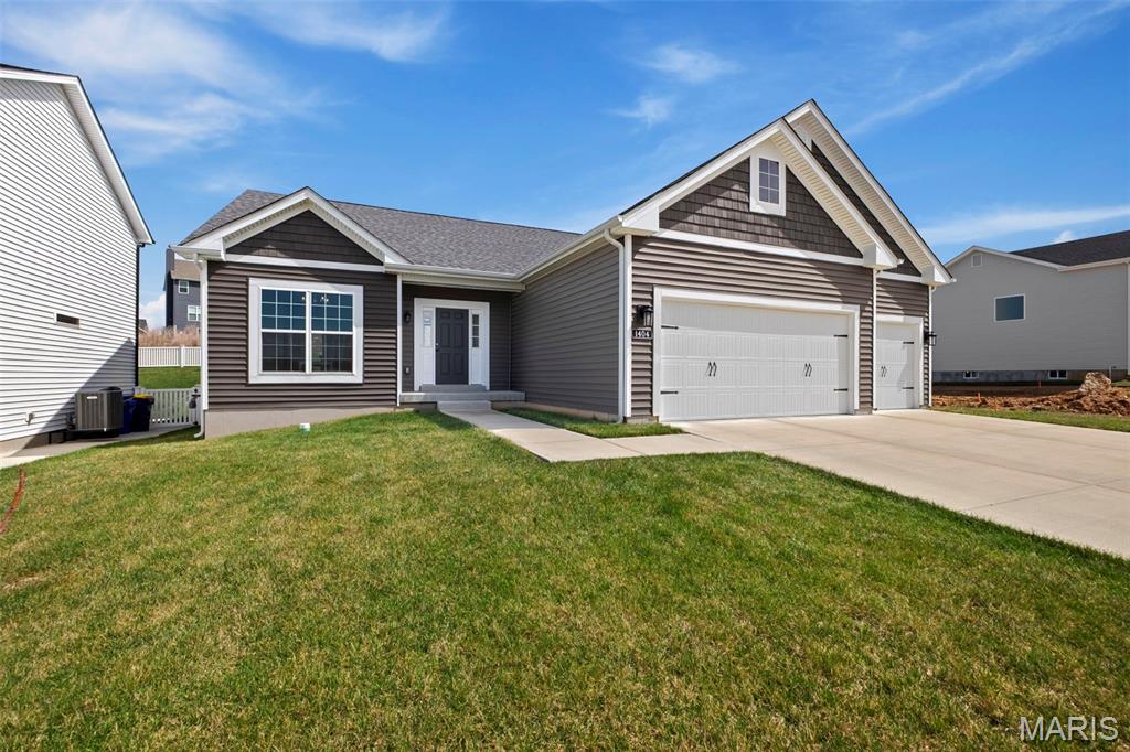 Continue to show! Why wait to build when you can move right in? Built in 2021 by Consort Homes, this 4-bedroom, 3 full bath, 3-car garage ranch home is move-in ready. You’ll be captivated by the open floor-plan and soaring 11-foot ceilings in the main living space that is accenuated with modern and recessed lighting. Oversized windows bathe the space in natural light, where the main living area and dine-in kitchen (with access to the rear yard via sliding glass doors) blend seamlessly into one functional open space. The kitchen offers quartz countertops, subway tile backsplash, an 8-foot dine-up quartz island, stainless steel appliances, built-in speakers from The Sound Room and sleek custom cabinetry. The dining room has been virtually-staged to demonstrate the versatility of the space. Whether it’s used as a playroom, as it is currently, a dining room or an office, the space can easily accomodate your needs. Three bedrooms are conveniently located on the main level, including a primary ensuite with separate tub and shower and dual sinks. The second full bathroom, laundry room (LG washer and dryer stays) and drop-spot off the garage add to the convenience of ranch-style living. The lower level offers the fourth bedroom, third full bathroom and a recreational haven for extra living space. There's no lack of storage here with over 1100 square feet of unfinished space to keep you organized. Outside, you will be spoiled with the inground sprinkler system and open space for grilling, playing or simply relaxing under the open sky. Located in Windswept Farms, this community offers a barn-style pavilion, community gardens and plenty of common ground to explore. This thoughtful design created by one of St. Louis’s premier builders is an entertainer’s delight and a peaceful retreat all in one. Enjoy proximity to Eureka's plentiful amenities, including Six Flags St. Louis, Hidden Valley Ski Resort and Shaw Nature Reserve, while reaping the rewards of Rockwood schools and lower Jefferson County taxes. This property is a must-see; it's even better in-person!