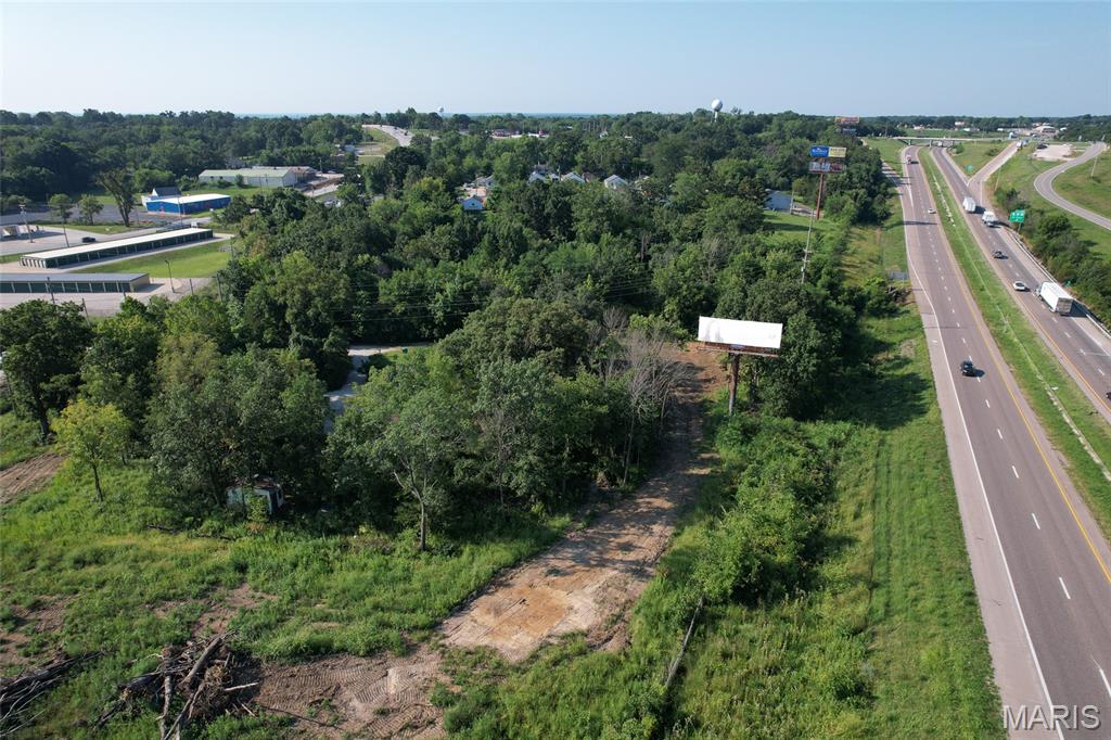 Prime 2.78-Acre Commercial Lot with Exceptional I-44 Visibility! This cleared and ready-to-build 2.78-acre commercial property offers outstanding exposure with 700 feet of visibility along Interstate 44, perfectly positioned between Exit 239 and Exit 240. Site includes two income-producing billboards that currently generate $190/month, with the opportunity for the new owner to renegotiate the lease for improved terms. Whether you're planning to build an automotive shop, light manufacturing facility, or another commercial venture, this property delivers the visibility, access, and flexibility you need.