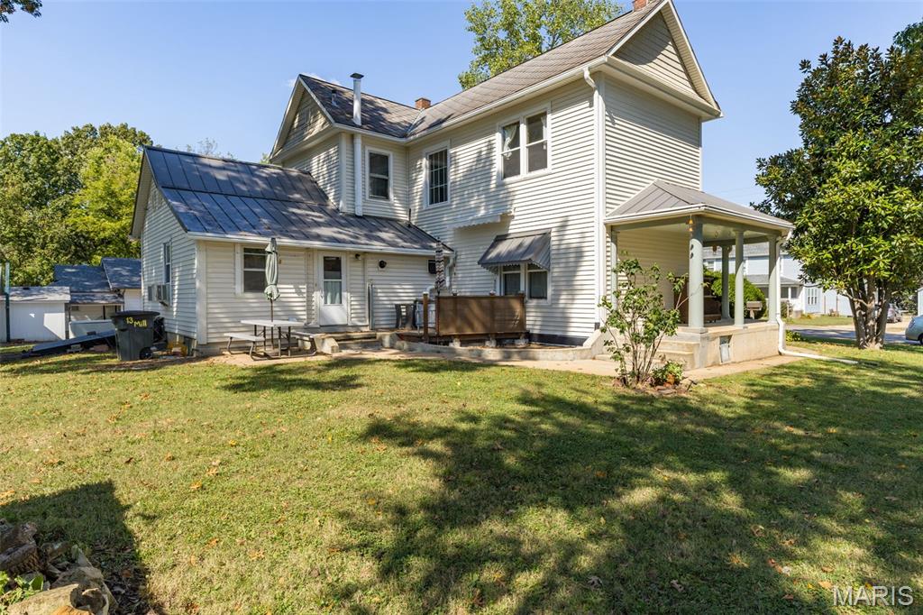 Investor special with serious upside in the heart of Bonne Terre! This 1890-built two-story offers over 2,300 sq ft on a large 0.73-acre city lot—now priced to allow room for renovation and profit. With strong bones and standout historic features like original hardwood floors, tall ceilings, detailed millwork, and cast-iron radiators, this property is a prime candidate for a flip, rental conversion, or long-term hold.

The layout includes 4 large bedrooms, 2 full baths (upper bath needs repair), formal living and dining areas, and a spacious kitchen ready for updates. Generous room sizes and flexible spaces make it ideal for maximizing after-repair value. Main-level laundry and a functional floor plan add to the appeal for future occupants or tenants.

Major mechanical upgrades are already in place, including a gas tankless water heater and whole-house generator—reducing upfront rehab costs. Additional value-add features include a walk-up basement access, indoor sauna, outdoor hot tub, and multiple storage/workshop areas.

Situated on a wide city lot with mature trees, detached carport, and public utilities, the exterior offers room for improvement and added curb appeal. Convenient location near Bonne Terre, Park Hills, and Desloge supports strong resale or rental demand.

Property is being sold as-is and will require repairs, but the current price reflects the opportunity. Whether you’re looking to flip, BRRRR, or restore a historic property with character, this one has the margin and potential to make sense.

Highlights:
• 2,300+ sq ft historic home with strong structural appeal
• 4 bed / 2 bath (upper bath needs repair)
• Tankless water heater + whole-house generator already installed
• Original hardwoods, tall ceilings, and period details
• Walk-up basement access + additional storage/workshop space
• 0.73-acre city lot with utilities
• Ideal for flip, rental, or long-term hold

Bring your vision and run the numbers—this is the kind of project investors look for.