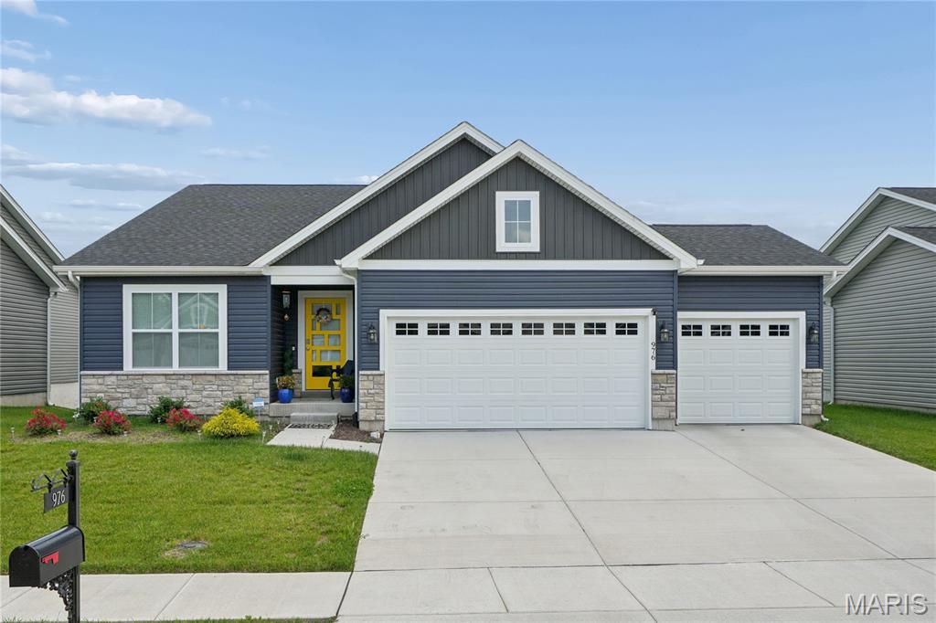 Welcome to this stunning newer construction contemporary ranch located in desirable Florissant, just steps from Hazelwood Central Senior High School. This beautifully designed home offers 3 bedrooms and 3 bathrooms with a spacious open floor plan perfect for modern living and entertaining.  The finished lower level with additional bedroom and full bath has great windows and walk out door to the patio and yard.

The heart of the home is a striking white kitchen featuring elegant white granite countertops, premium GE Café appliances, and a clean, sophisticated design that flows seamlessly into the main living areas.  The large island provides generous kitchen works space, eat-in kitchen potential or the best views of the chef at work.  A 4’ electric fireplace adds visual warmth and glamour to the room.

Thoughtful finishes are found throughout, including LVP flooring in the main living spaces and lower level, along with LVT flooring in bathrooms, combining durability with style. The primary ensuite offers a comfortable retreat with updated features.

Step outside onto the generous 14’ x 12’ deck, ideal for relaxing or entertaining while overlooking a fenced backyard and peaceful adjoining common ground for added privacy and green space.  Additional exterior highlights include a white cultured stone watertable, adding curb appeal and timeless character.

This home perfectly blends modern finishes, functional design, and a great location—don’t miss the opportunity to make it yours!
