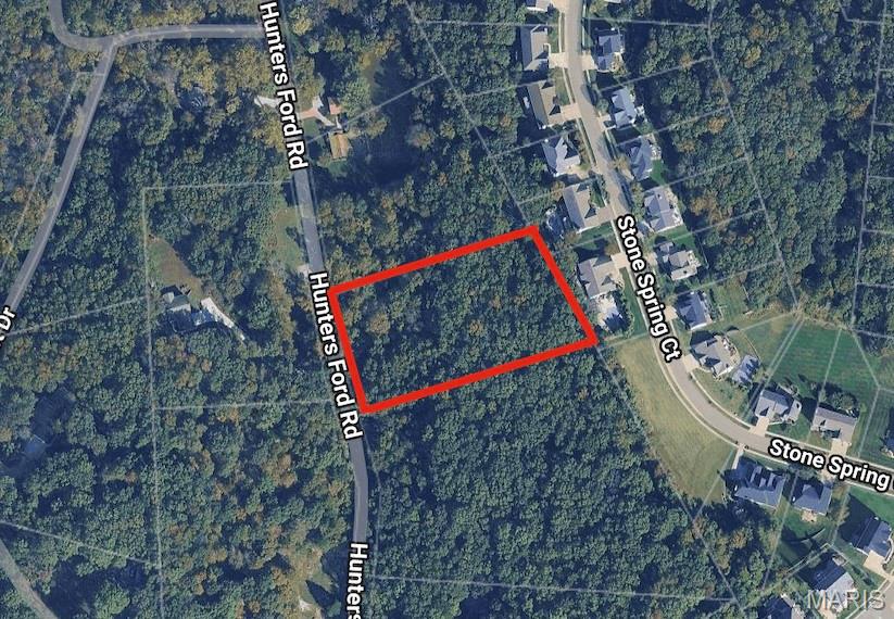 Tucked away on 2.27 beautifully wooded acres, this private retreat offers the perfect blend of nature, serenity, and value. Towering trees surround the property, creating a peaceful setting where you can unwind, explore, and truly feel removed from the hustle of everyday life. Whether you’re envisioning your dream home or a quiet escape, this picturesque lot provides the ideal canvas. With its natural beauty, abundant privacy, and exceptional price point, this is a rare opportunity to own a slice of tranquility without compromising on value. Rockwood Schools.