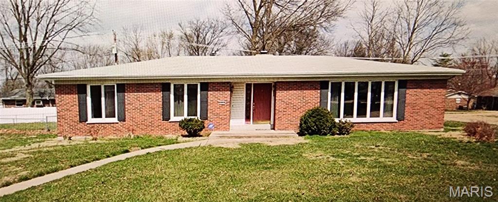 Wow, you will love this large 3 bedroom 2 bath Ranch style brick home! This sparkling gem has an open & bright floor plan with wood flooring throughout the large formal living and dining room Hall way and bedrooms. Substantial great/family room with wood burning fireplace and skylight with French doors that walk out to an oversized patio. Large kitchen, with custom cabinets, new stainless steel refrigerator, built in appliances & microwave. Home is nicely updated with newer windows for low utility cost, its been freshly painted and will be ready for that special family. Large fenced in yard with a oversized brick patio that you can walk out from the family room to enjoy those great outdoor get togethers. Full basement with room to entertain indoors for those rainy & cold days. This is a great location close to parks, shopping, food, walking path in rear of subdivision, and so much more. Big oversized 2 car garage. You will enjoy calling this your home for a year or more.