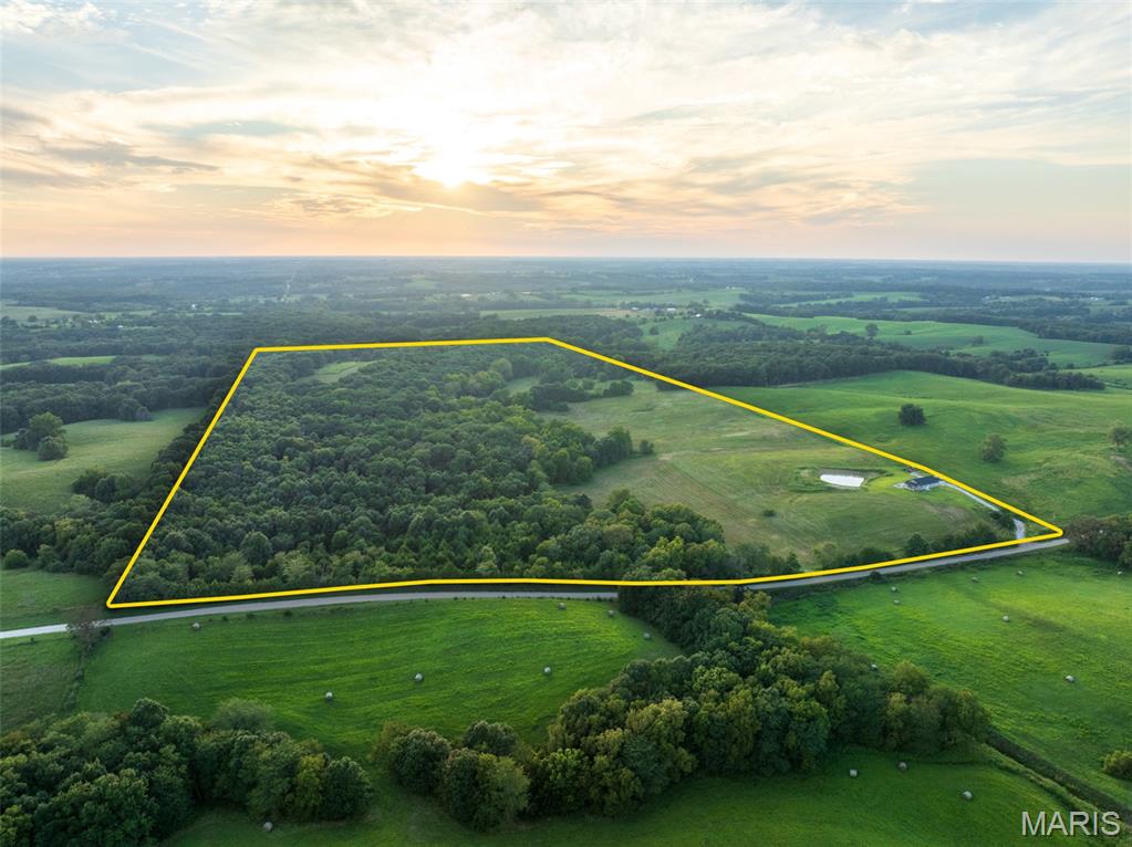 Discover the perfect blend of peaceful country living and outdoor recreation on 81.65 acres in Linn County. This impressive property is a hunter’s dream, offering abundant acreage, privacy, 2 ponds and plenty of room to enjoy the outdoors. The inviting 3-bedroom, 2-bath ranch home features a spacious open floor plan highlighted by a vaulted ceiling, creating a bright and comfortable main living area. The functional layout also includes a dedicated laundry room and convenient one-level living. Step outside to the covered front porch, where you can relax and take in beautiful views of the surrounding countryside. With 81.65 surveyed acres to explore, the property offers outstanding potential for hunting, recreation, wildlife watching, and enjoying the peace and quiet of rural living. Whether you're searching for a full-time residence, weekend hunting retreat, or private recreational getaway, this Linn County property offers the acreage, setting, and comfortable home you've been looking for.