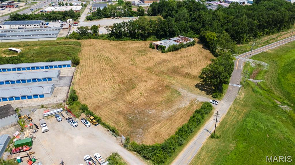3.9 acres located in Cape's industrial park just off Kingshighway with close proximity to I-55 and Hwy 74, featuring a 7,500 sq. ft. industrial warehouse. The building is in need of repairs but offers a solid foundation with a concrete floor and durable steel structural frame.