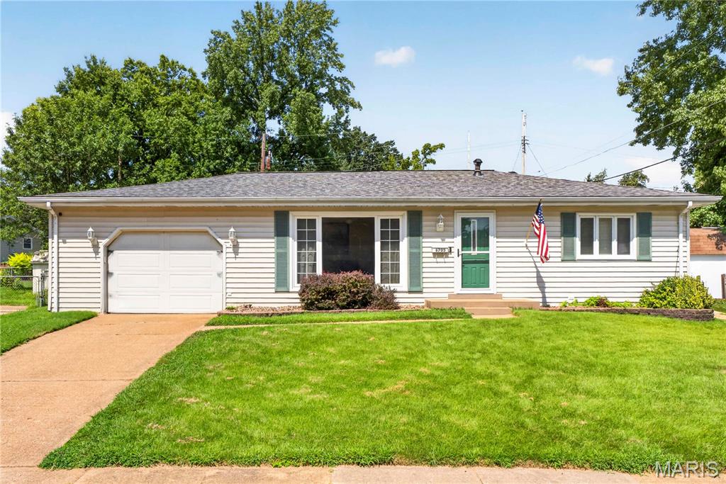 Welcome home to 6705 Vineland Dr! Tucked in the heart of Hazelwood off Howdershell, this charming home is full of appeal and packed with standout features! Step into the bright and inviting living room, where a large picture window fills the space with natural light. The eat-in kitchen offers a gas range, custom tile backsplash, and walk-in pantry, while just off the kitchen, the impressive hearth room steals the show with its all-brick wood-burning fireplace and walls of windows making it the perfect space for dining, entertaining, or simply unwinding. Hardwood floors flow throughout the living room and all three bedrooms, and the main level includes a full bath with classic ceramic tile. The partially finished basement adds even more living space with room to entertain and a bonus room loaded with outlets ideal for a home office, hobby room, or workout space. Step outside to the fully fenced backyard, perfect for pets, play, or outdoor gatherings. And one of the true highlights of this home is the oversized 2-car tandem garage/workshop a rare find offering incredible space for parking, storage, tools, projects, and more! Conveniently accessible from the kitchen, it adds both function and flexibility to everyday living. Don’t miss your chance to make this one-of-a-kind home yours, schedule your showing today!