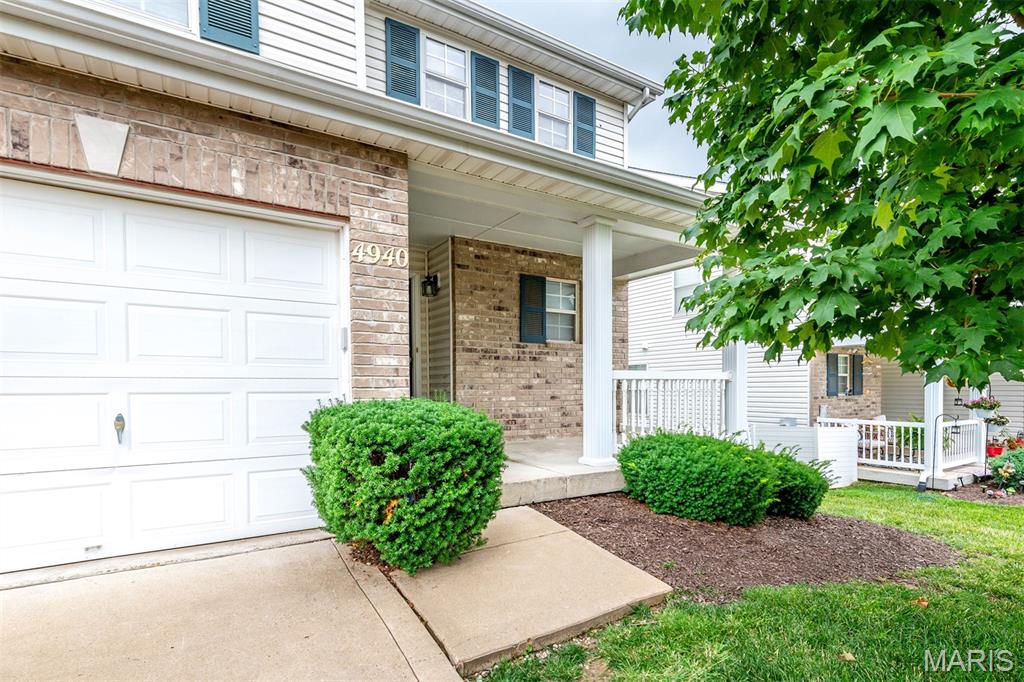 This Beautiful, Tastefully Decorated Newer Townhome in the Hurstborough Subdivision in North County!  The main level offers an open and spacious living room, kitchen, breakfast room, and half bath. The kitchen features hardwood floors extending into the breakfast room, upgrade cabinets, microwave, electric stove, bay window overlooking backyard. The upper level features master bedroom with Cathedral Ceiling & Oversized walk in closet, and a full master bath, a second generous sized bedroom, loft area, and another full bath.  The walk-out basement is spacious and could easily be made into a family room or extra bedroom and a full bath.  New floor installed for living room, and upper floor.  Fresh painted throughout.  New ceiling fan with lights installed in living room, new stove and dishwasher.