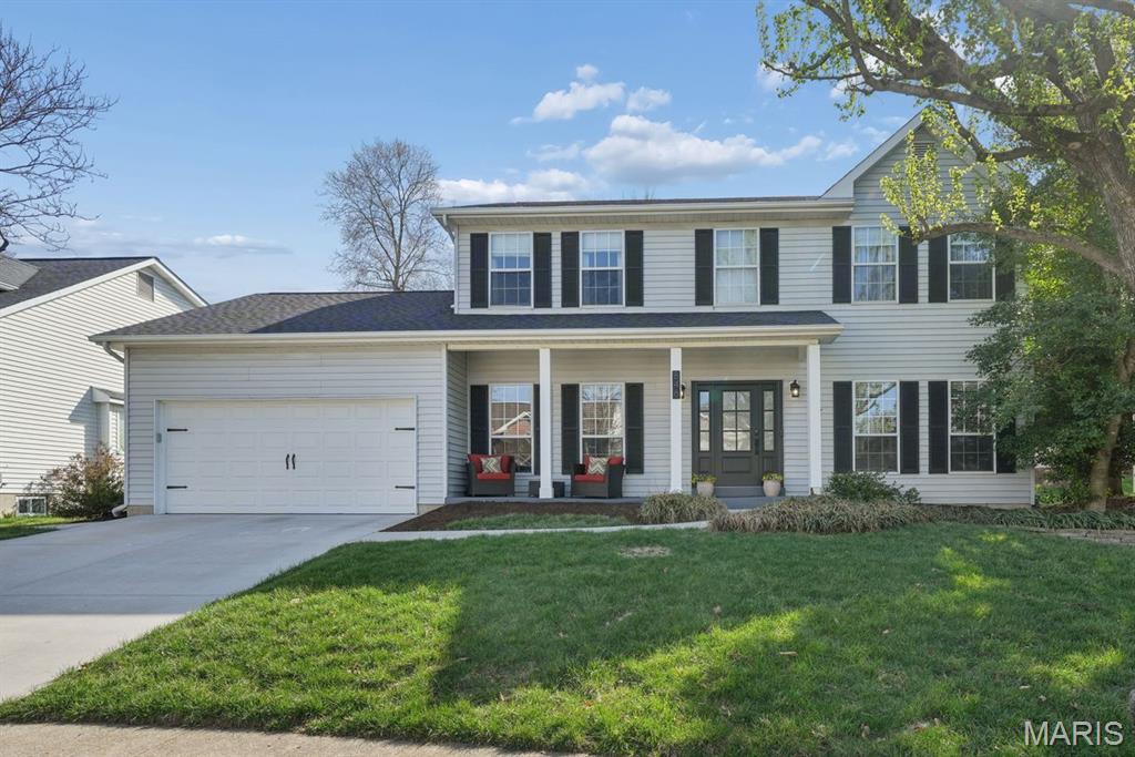 This gorgeously updated two-story is ready for you to move in and start making memories! The main floor is open and inviting with a living room that leads to the family room which features a bay window seat with storage and a gas fireplace with stone surround, flanked by built-ins. The bright and spacious kitchen is ready to cater any occasion with a center island, gas range, stainless appliances, wine fridge, pantry, and tons of counter and cabinet space with soft close hardware. The breakfast room leads out to the screened in patio and the showstopper of a fenced in backyard where you and your family will want to spend the whole summer. The office could also be used as a separate dining room if you choose for more formal meals and holidays. A mud room off the 2-car attached garage with epoxy flooring offers storage space, main floor laundry, and provides access to the backyard deck. Outside, even the driveway is new! Upstairs, the primary bedroom suite is a retreat with vaulted ceilings, spacious walk-in closet, and a fully updated bath with dual-sink vanity, separate soaking tub, shower, and a skylight. Three additional bedrooms share the updated hall bath. The finished lower level offers even more living space in the large recreation room and enough space in the unfinished portion for both storage and a workout area.