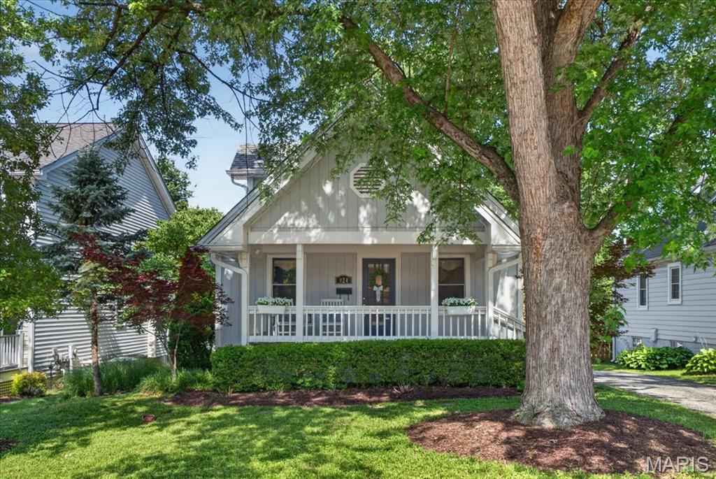 Enjoy the best of Kirkwood living in this beautifully updated 2-bedroom, 2-bath cottage 
located in one of the area's most desirable neighborhoods. Full of character and modern 
updates, this inviting home blends timeless charm with everyday comfort. 
A stunning vaulted front porch welcomes you inside, where the living room features 
soaring nearly 20-foot beamed ceilings, rich hardwood floors, and abundant natural light. 
The spacious kitchen with ceramic tile is ideal for both daily living and entertaining, offering stainless steel 
appliances, beadboard cabinetry, a center island, and a sunny breakfast room overlooking 
the backyard. 
The flexible floor plan includes a main-level bedroom and full bath, while the private upper
level suite provides a peaceful retreat with its own full bath. 
Outside, enjoy the beautifully landscaped, fenced backyard with ample space for 
entertaining, gardening, or relaxing. A detached two-car garage adds convenience and 
functionality. 
Ideally situated near downtown Kirkwood, local shops, restaurants, parks, and the popular 
Kirkwood Farmers' Market, this move-in ready home offers exceptional charm, location, 
and lifestyle. 
Property Highlights 
• 2 Bedrooms | 2 Full Bathrooms 
• Approximately 1,380 Sq. Ft. 
• Soaring Beamed Ceilings 
• Hardwood Floors 
• Private Upper-Level Suite 
• Fenced Backyard 
• Detached 2-Car Garage 
• Convenient Access to Downtown Kirkwood, Dining, Shopping & Farmers' Market 
A rare opportunity to own a charming Kirkwood cottage in one of the area's most sought-
after neighborhoods.
