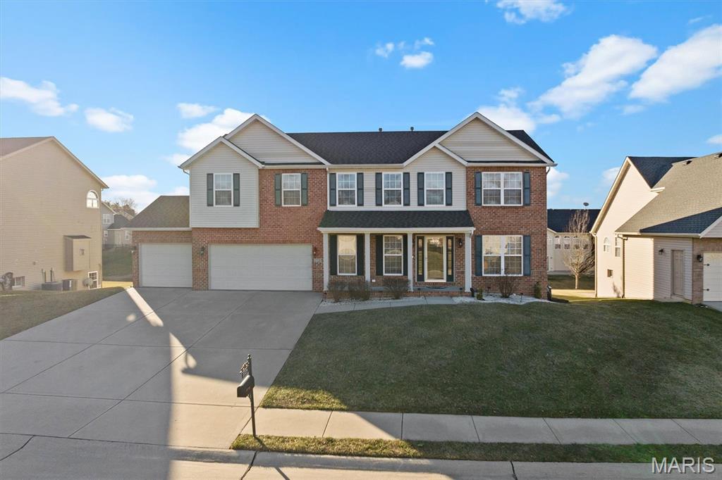 Welcome to 2728 Lauren Lake Drive, a stunning opportunity in the highly sought-after High Valley Lake Estates community of Shiloh! This spacious 4-bedroom, 3.5-bath home offers the perfect combination of style, space, and location, with thoughtful updates and desirable features throughout.

Step inside to discover a bright and inviting layout designed for today's lifestyle. The main level features generous living spaces, a beautiful kitchen with abundant cabinetry and workspace, a dedicated dining area, and a welcoming family room with fireplace, ideal for entertaining guests or relaxing with family. The finished lower level adds incredible flexibility with additional living space, a full bathroom, and room for a recreation area, home gym, office, or guest retreat.

The upper level offers spacious bedrooms, including a private primary suite with walk-in closet space and a relaxing retreat-like feel. Enjoy your morning coffee or evening gatherings on the screened porch and deck while taking in the peaceful surroundings of this desirable neighborhood.

Located in the heart of Shiloh with easy access to Scott Air Force Base, shopping, dining, top-rated schools, and commuter routes, this home checks all the boxes for comfort, convenience, and lifestyle.

Homes with this much space and an exceptional location don't last long.  Schedule your private showing today and make 2728 Lauren Lake Dr the one you call home!